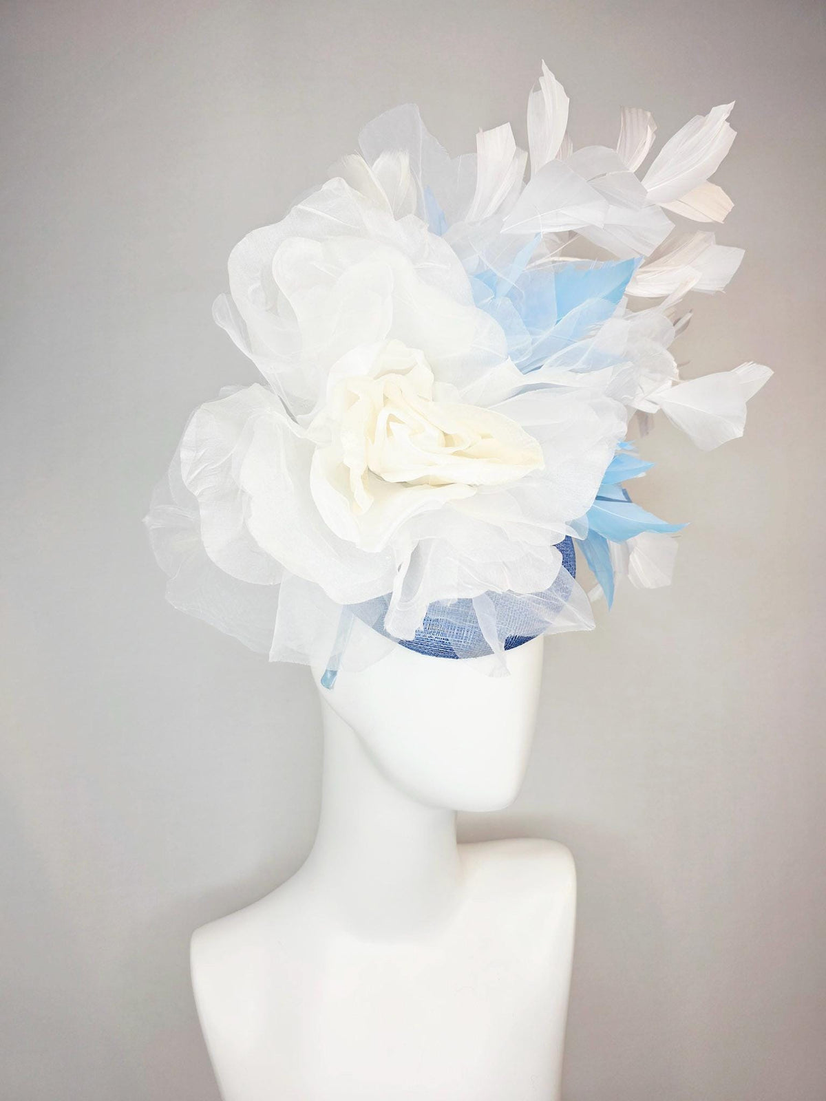 kentucky derby hat fascinator denim blue sinamay with large ivory white organza rose flower sky blue and white branching feathers