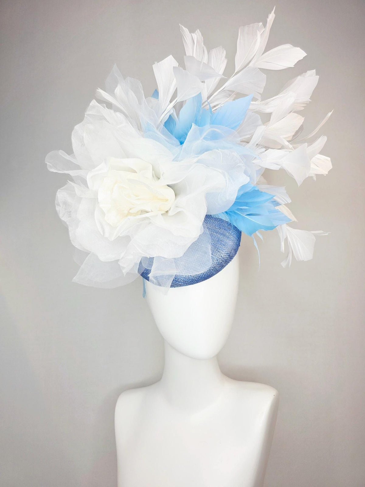 kentucky derby hat fascinator denim blue sinamay with large ivory white organza rose flower sky blue and white branching feathers