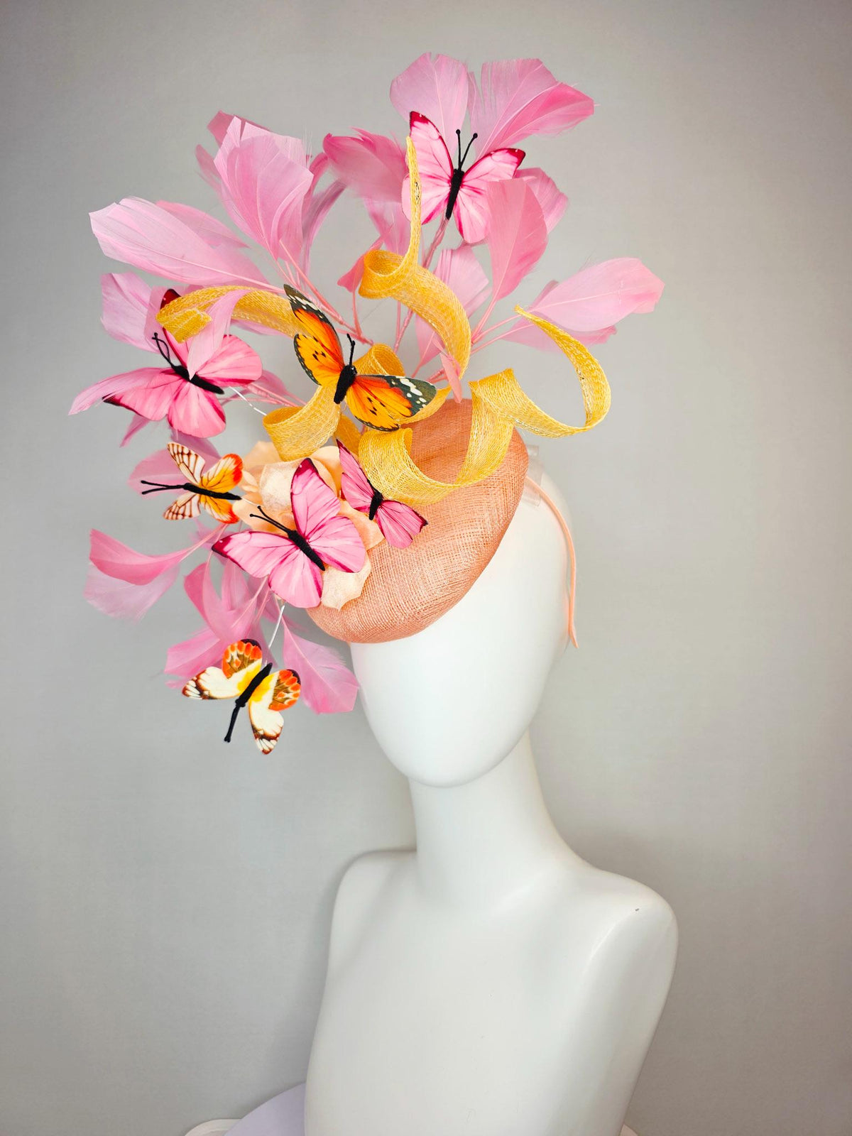 kentucky derby hat fascinator champagne sinamay yellow curls cream gold organza flower light pink feathers orange black pink butterflies