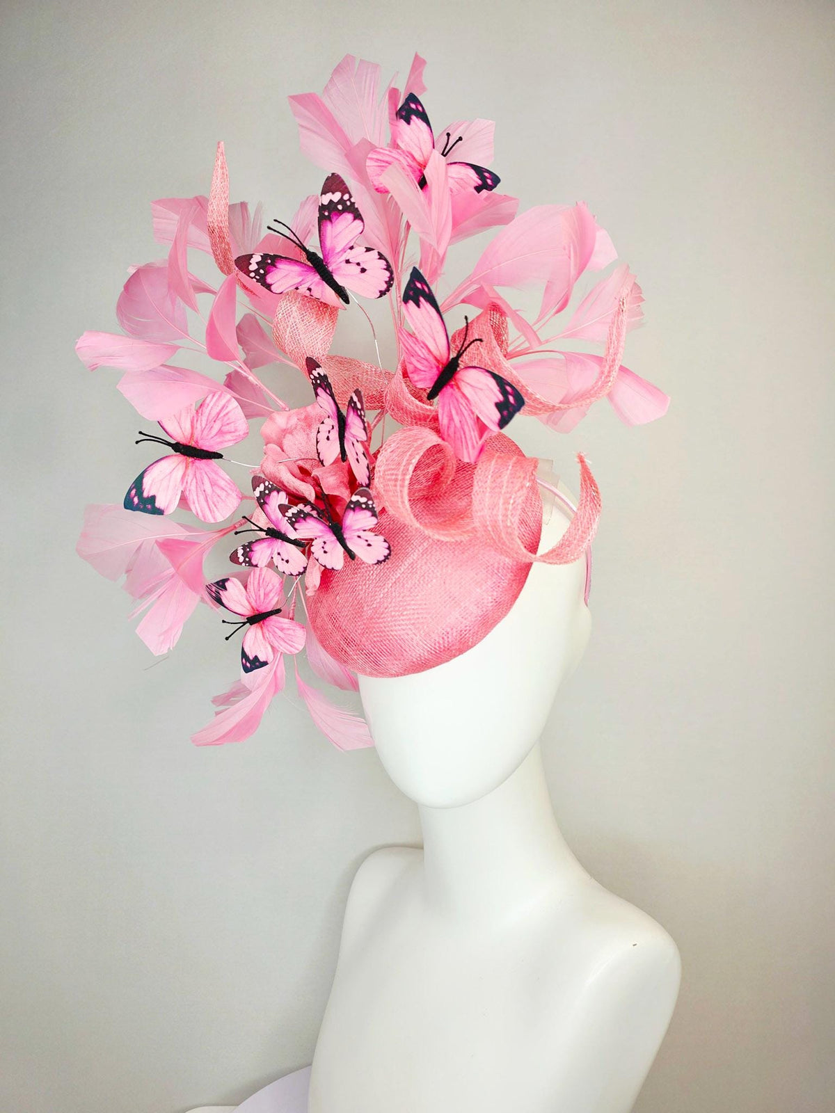 kentucky derby hat fascinator dusty pink sinamay with curls rose pink organza flower baby pink feathers light pink and black butterflies