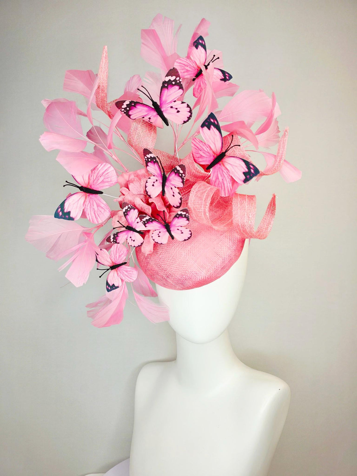 kentucky derby hat fascinator dusty pink sinamay with curls rose pink organza flower baby pink feathers light pink and black butterflies