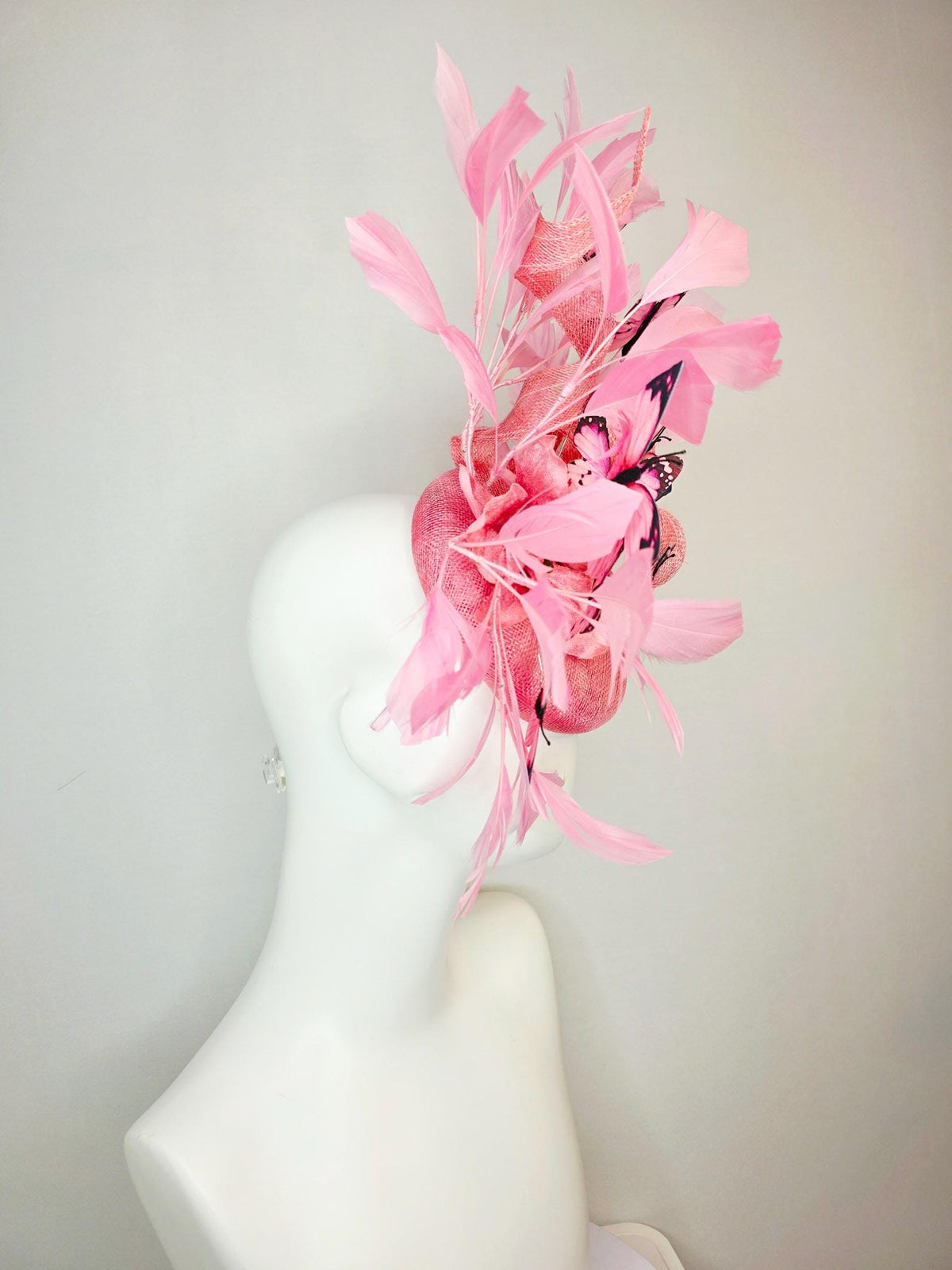 kentucky derby hat fascinator dusty pink sinamay with curls rose pink organza flower baby pink feathers light pink and black butterflies
