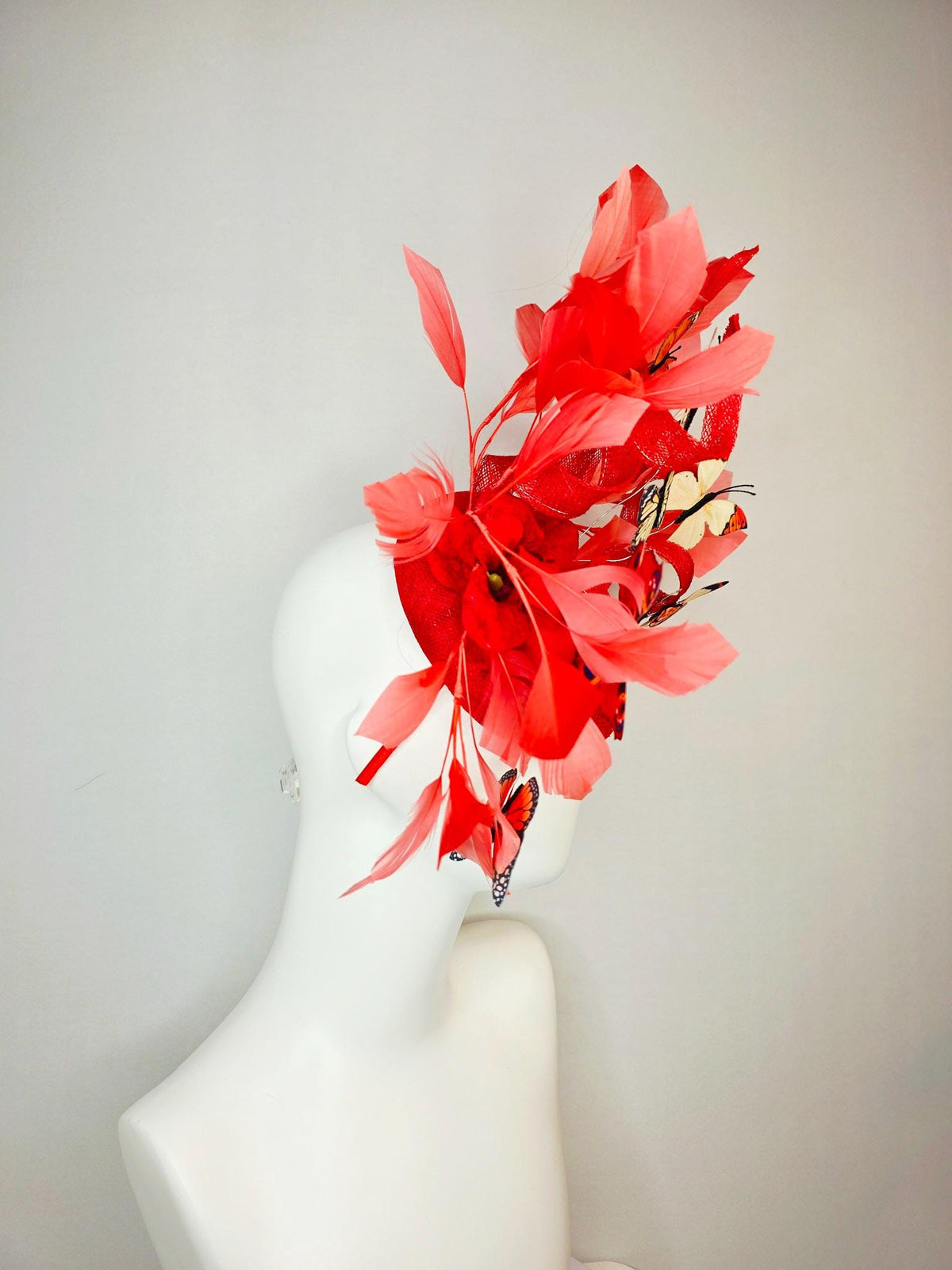 kentucky derby hat fascinator scarlet red sinamay with curls red organza flower coral red feathers white cream orange blue black butterflies