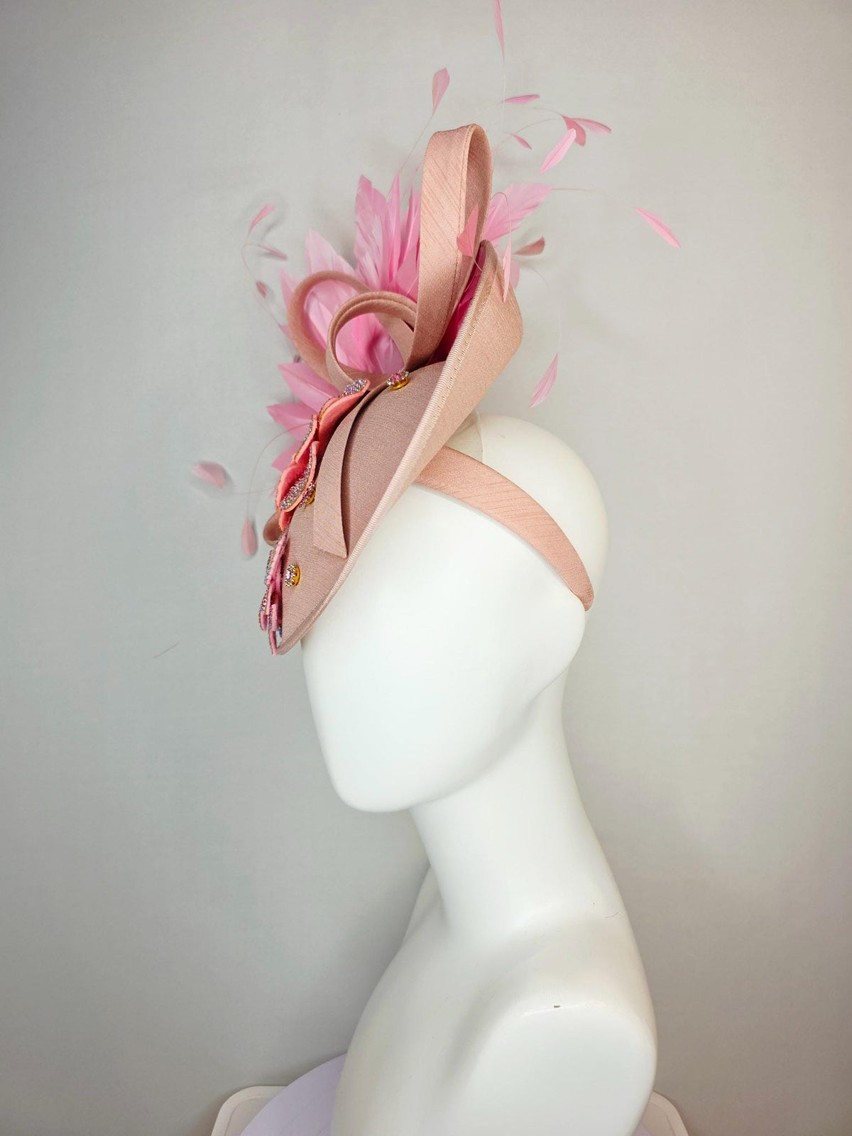 kentucky derby hat fascinator champagne pink shantung saucer with shantung bow iridescent pink crystal rhinestone flowers baby pink feathers