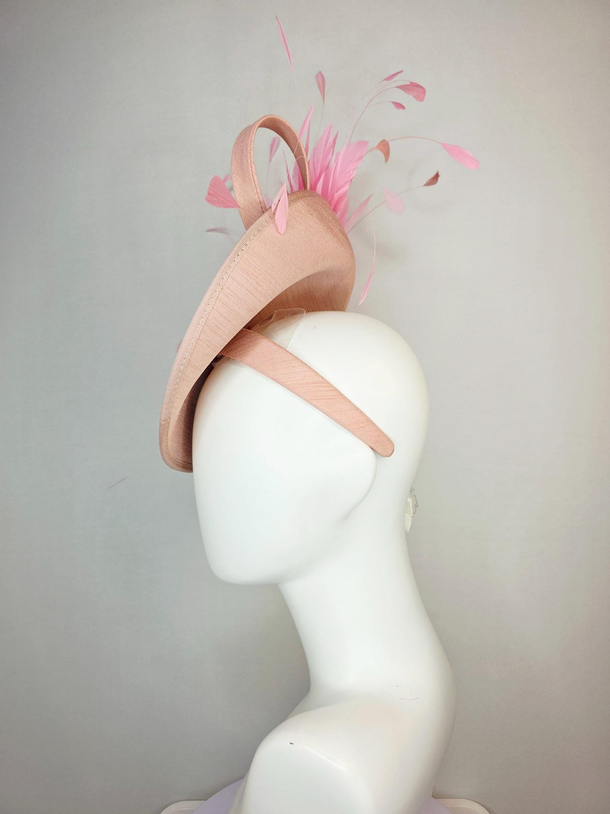 kentucky derby hat fascinator champagne pink shantung saucer with shantung bow iridescent pink crystal rhinestone flowers baby pink feathers