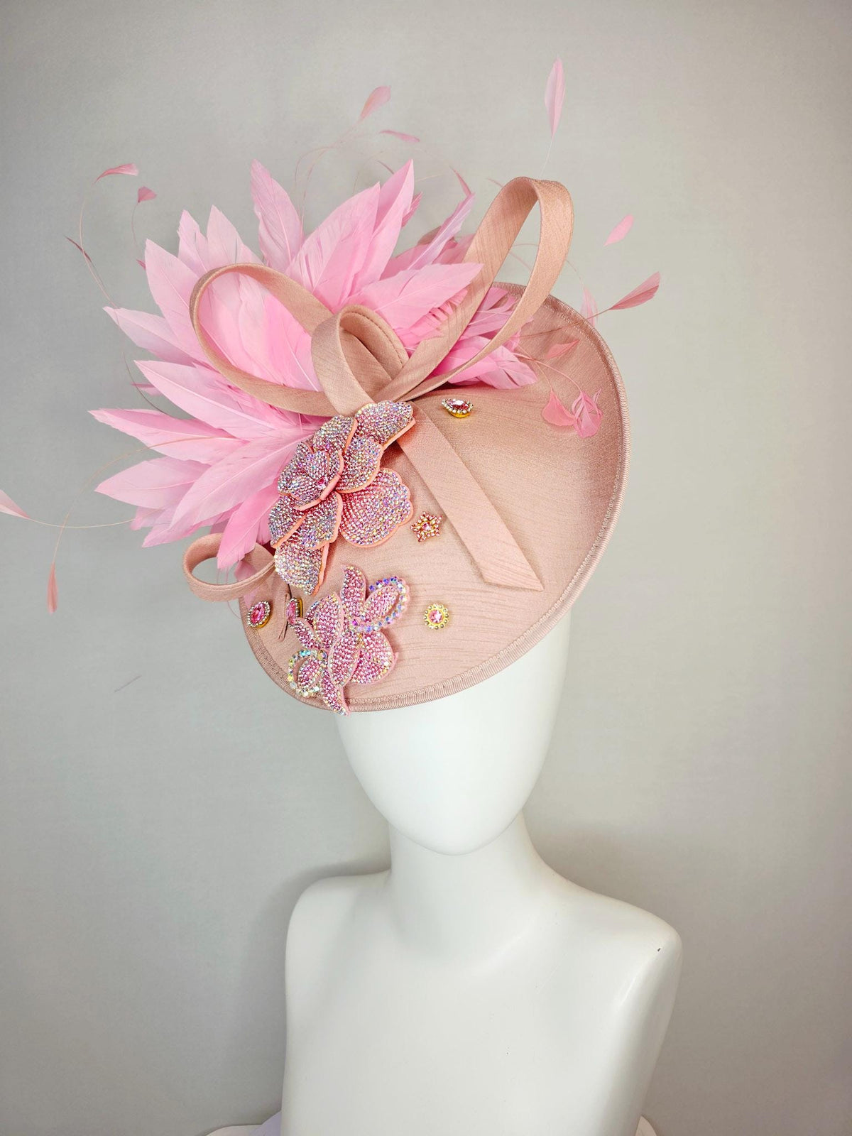 kentucky derby hat fascinator champagne pink shantung saucer with shantung bow iridescent pink crystal rhinestone flowers baby pink feathers