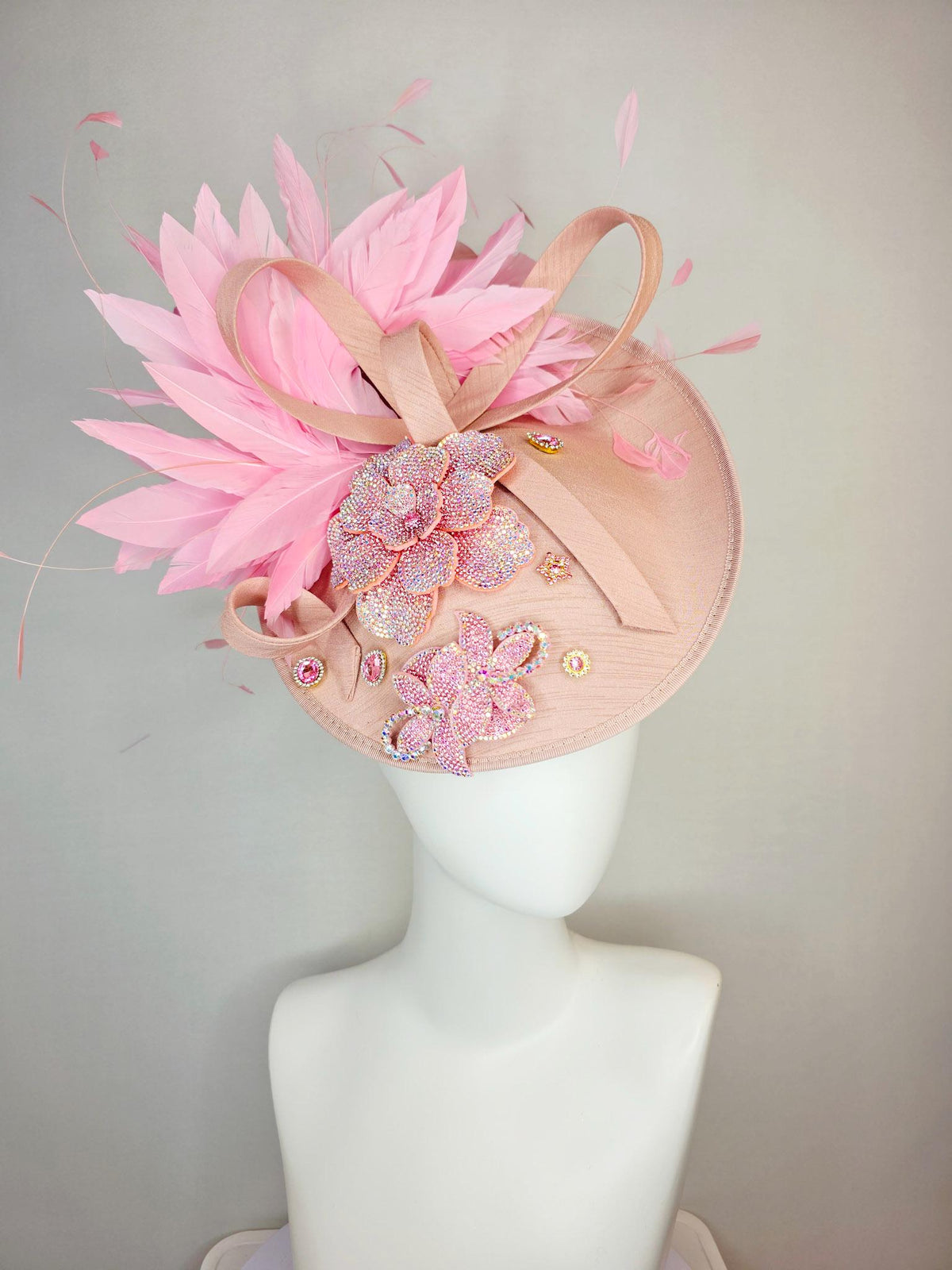 kentucky derby hat fascinator champagne pink shantung saucer with shantung bow iridescent pink crystal rhinestone flowers baby pink feathers