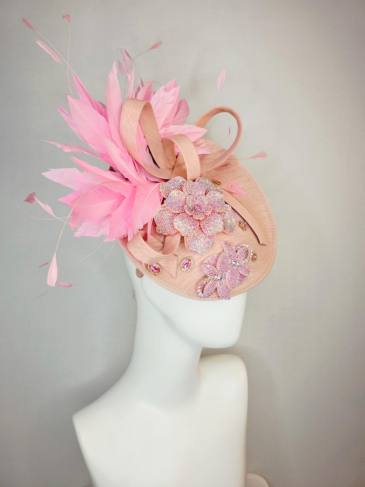 kentucky derby hat fascinator champagne pink shantung saucer with shantung bow iridescent pink crystal rhinestone flowers baby pink feathers