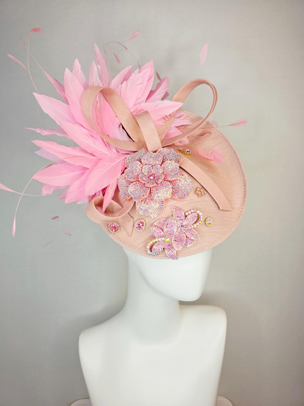 kentucky derby hat fascinator champagne pink shantung saucer with shantung bow iridescent pink crystal rhinestone flowers baby pink feathers