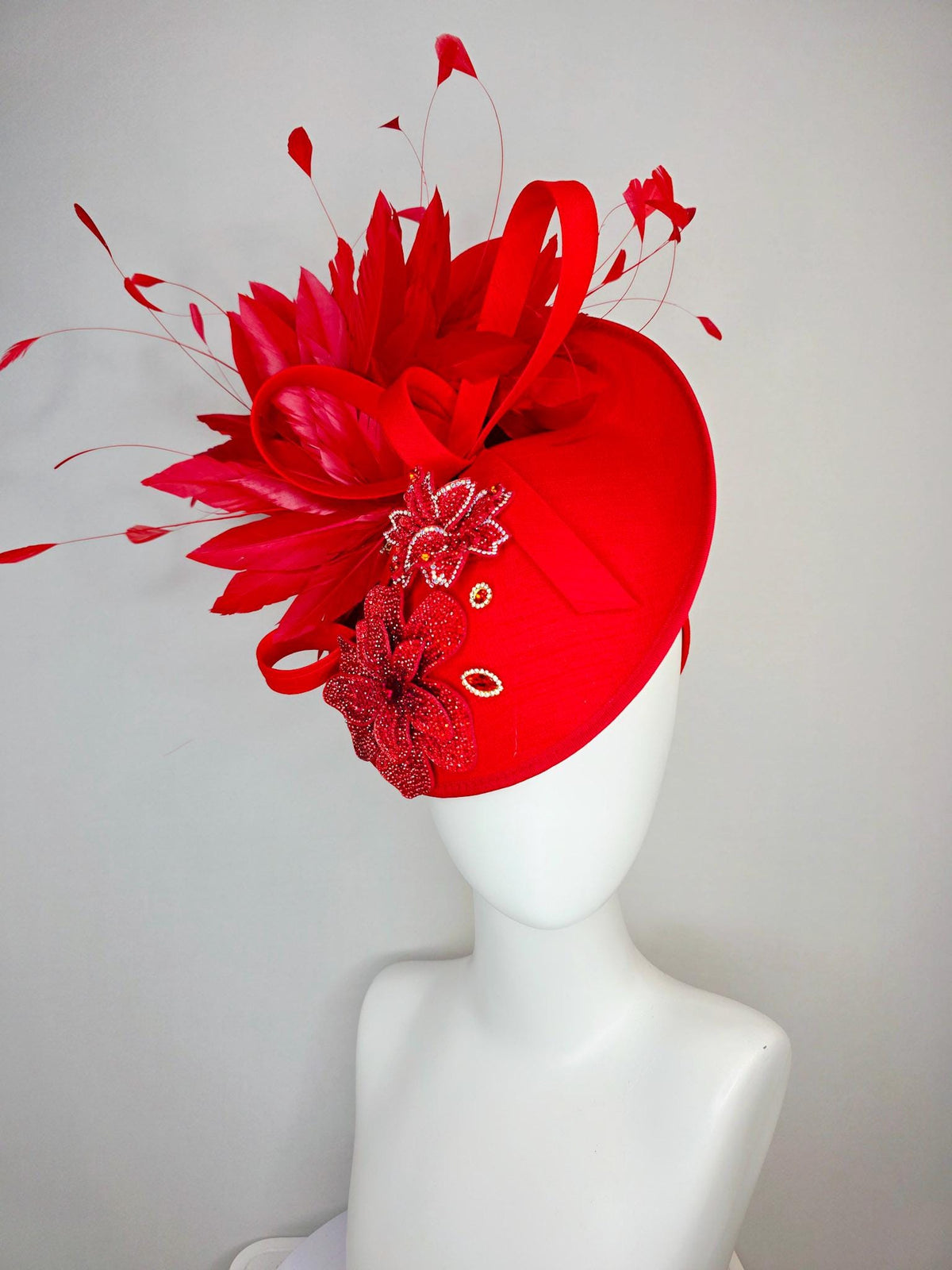 kentucky derby hat fascinator bright red shantung saucer with shantung bow red crystal rhinestone flowers scarlert red branching feathers