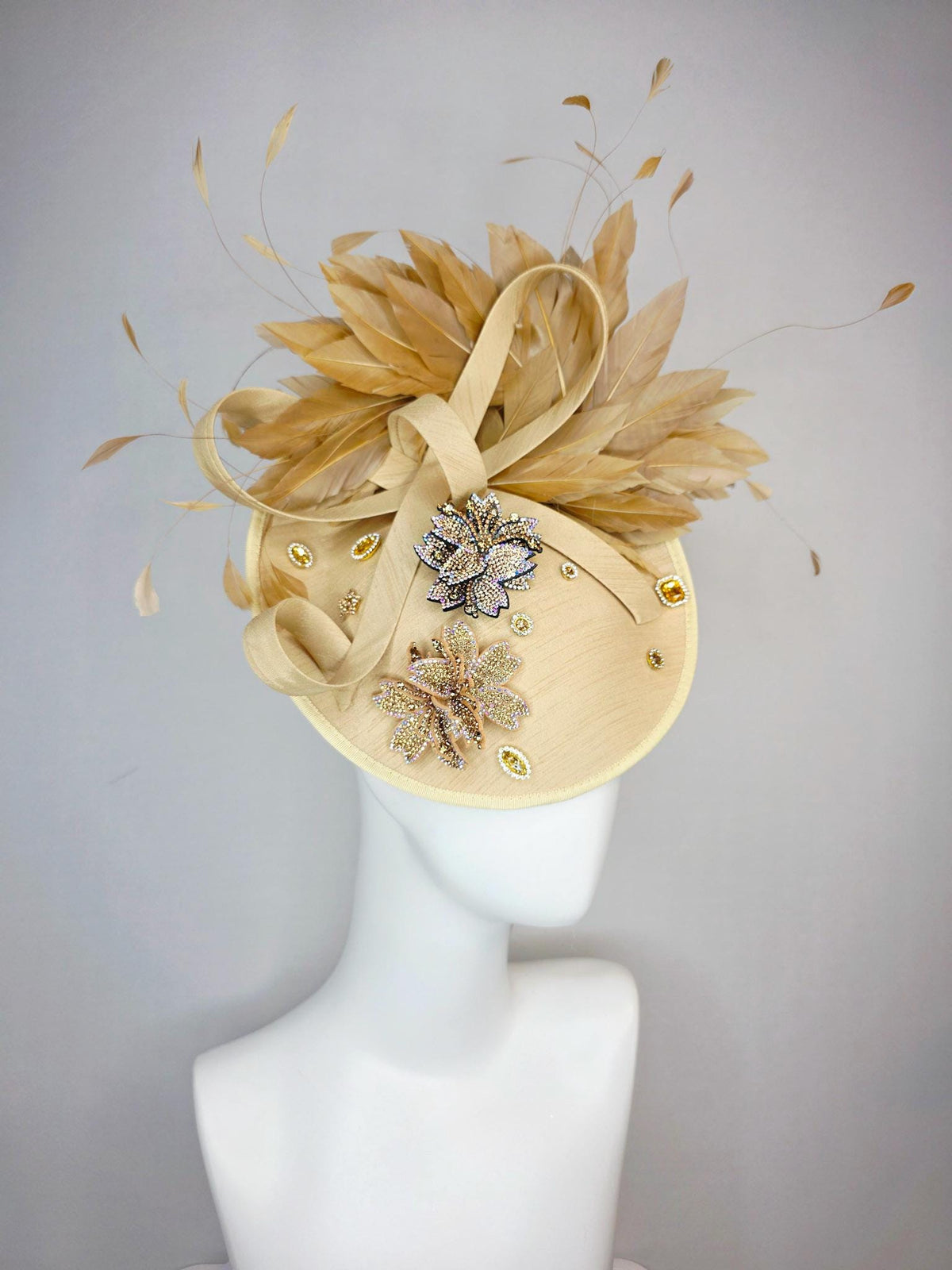 kentucky derby hat fascinator beige shantung saucer with shantung bow gold silver crystal rhinestone flowers tan beige gold feathers