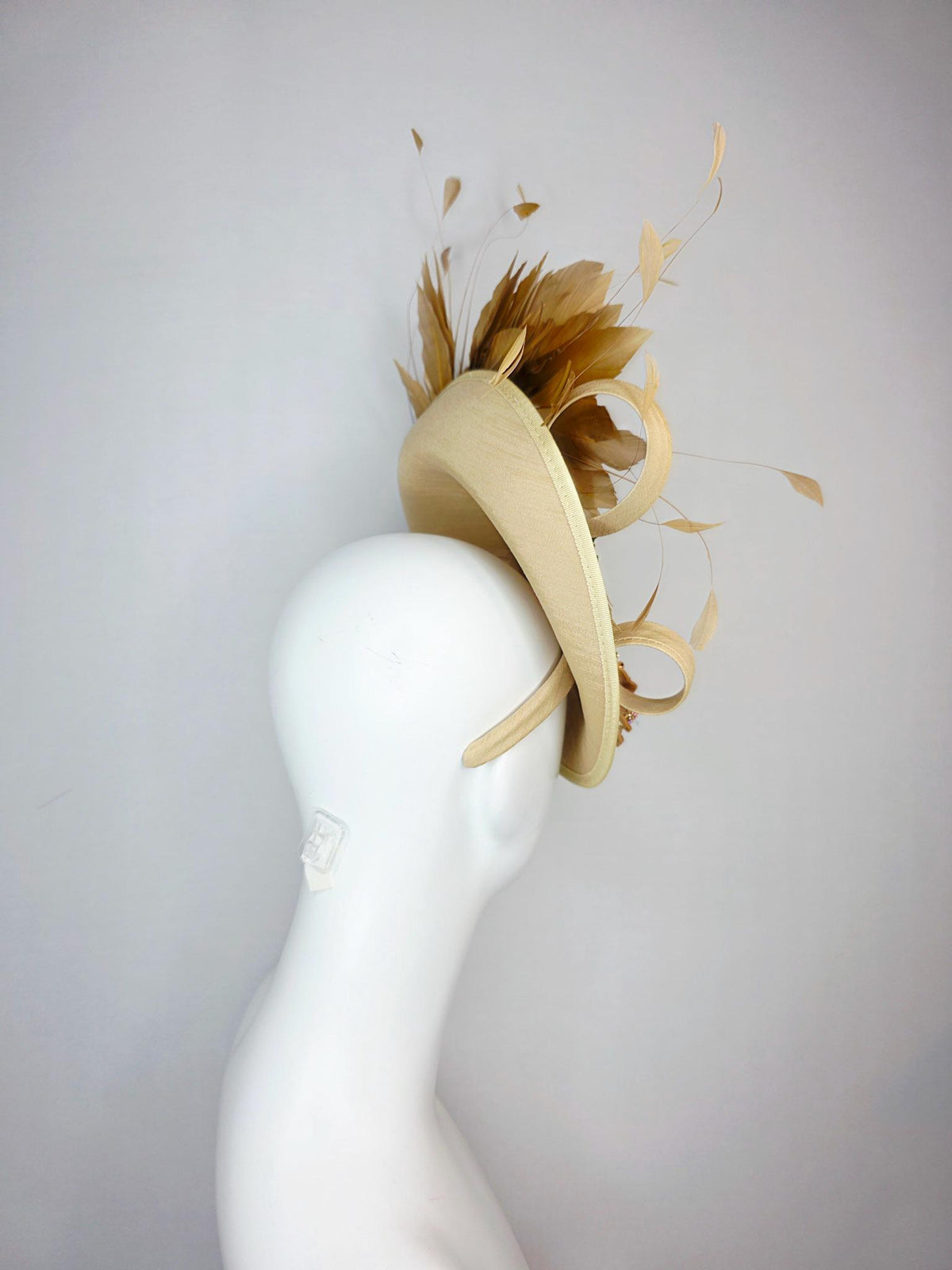 kentucky derby hat fascinator beige shantung saucer with shantung bow gold silver crystal rhinestone flowers tan beige gold feathers