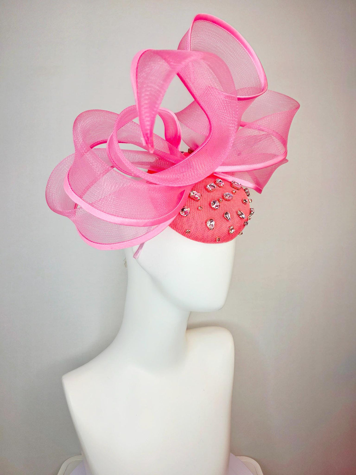 kentucky derby hat fascinator raspberry pink sinamay base with clear crystal jewels blush pink mesh wired ribbon large bendable bow decor