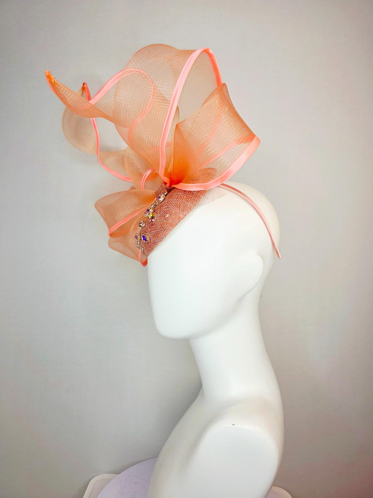 kentucky derby hat fascinator burnt orange sinamay base iridescent orange crystal jewels peach mesh wired ribbon large bendable bow decor