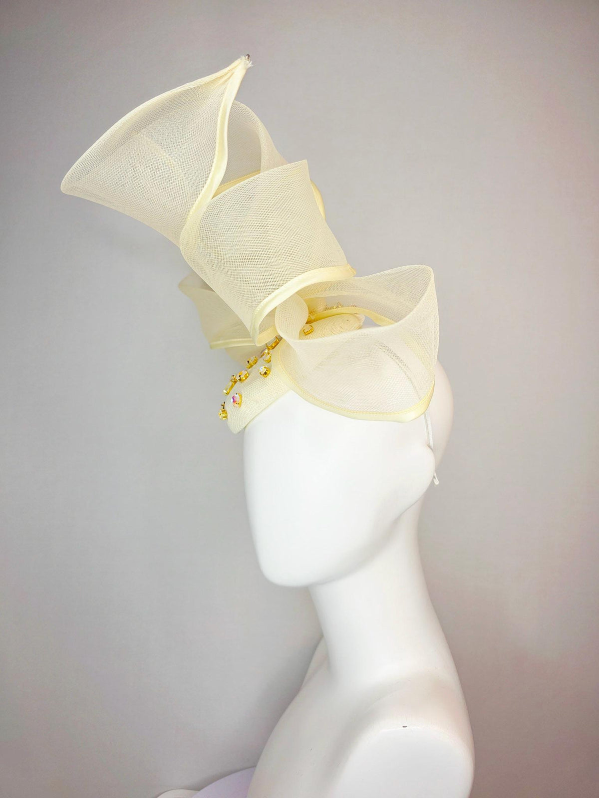 kentucky derby hat fascinator light yellow sinamay base with iridescent yellow crystal jewels mesh wired ribbon large bendable bow decor