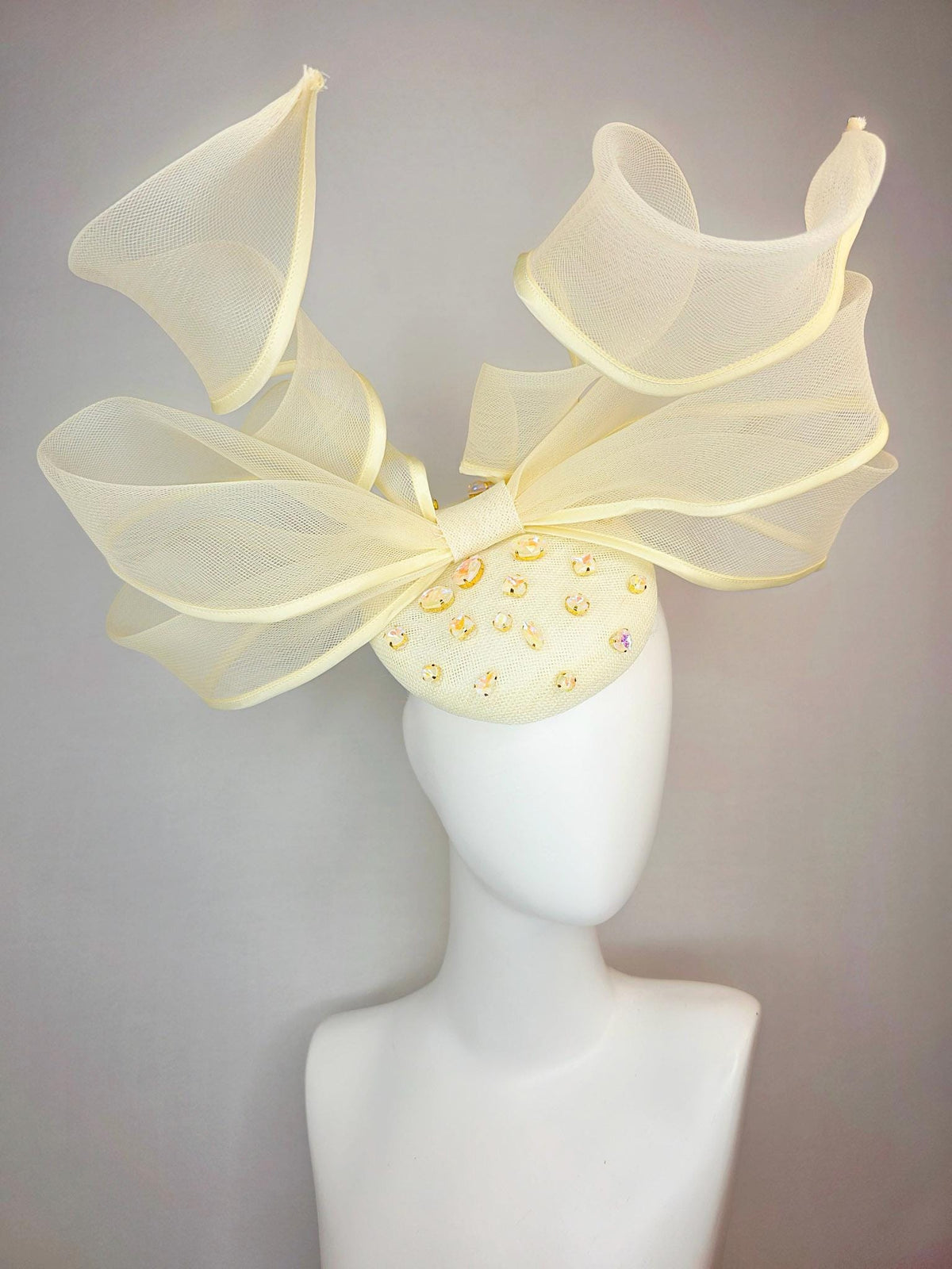 kentucky derby hat fascinator light yellow sinamay base with iridescent yellow crystal jewels mesh wired ribbon large bendable bow decor