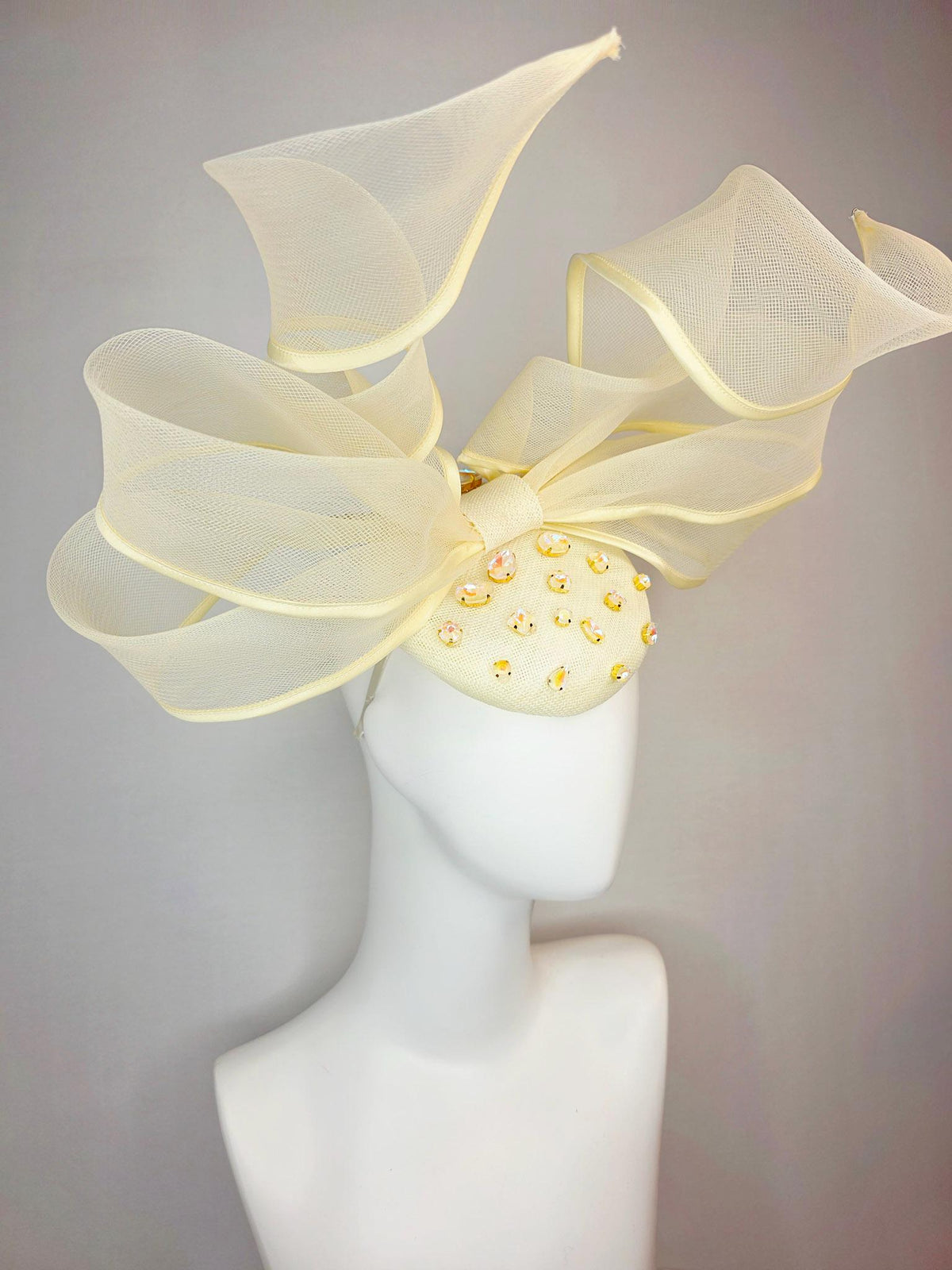 kentucky derby hat fascinator light yellow sinamay base with iridescent yellow crystal jewels mesh wired ribbon large bendable bow decor