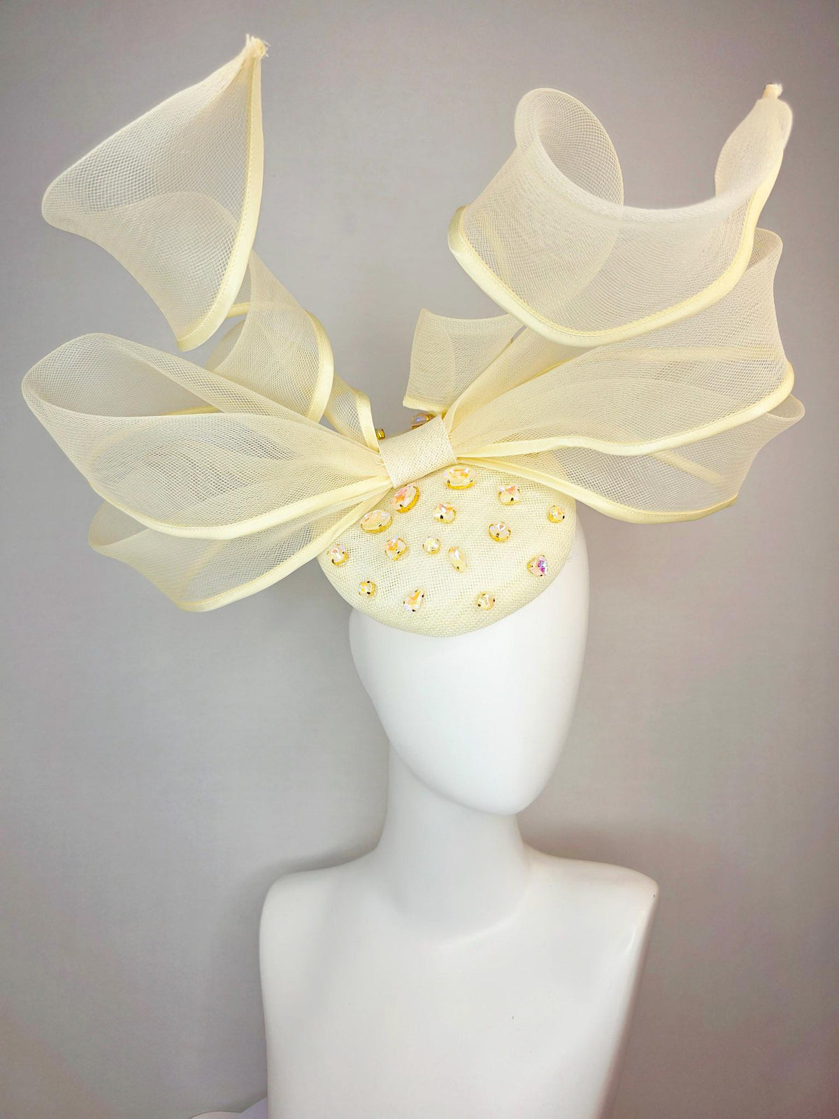 kentucky derby hat fascinator light yellow sinamay base with iridescent yellow crystal jewels mesh wired ribbon large bendable bow decor
