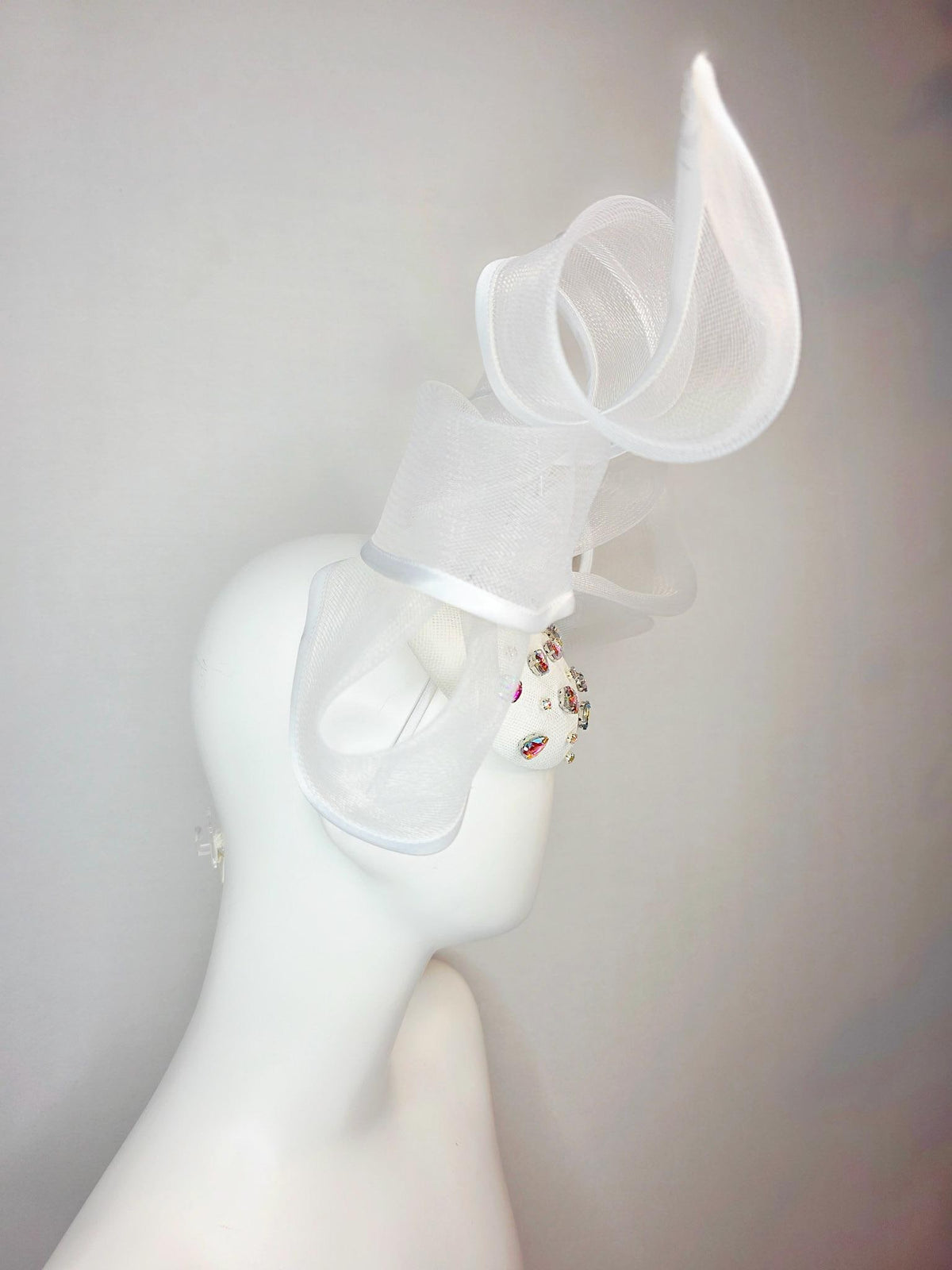 kentucky derby hat fascinator white sinamay base with iridescent clear crystal jewels white mesh and wired ribbon large bendable bow decor