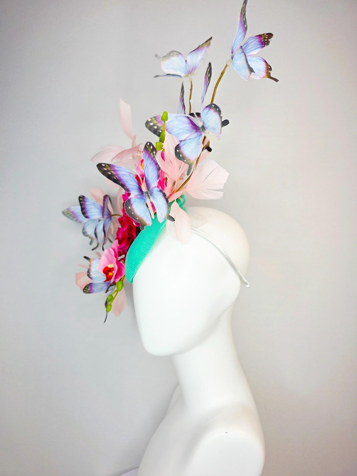 kentucky derby hat fascinator mint green sinamay red roses pink orchids pale light pink branching feathers black lavender purple butterflies