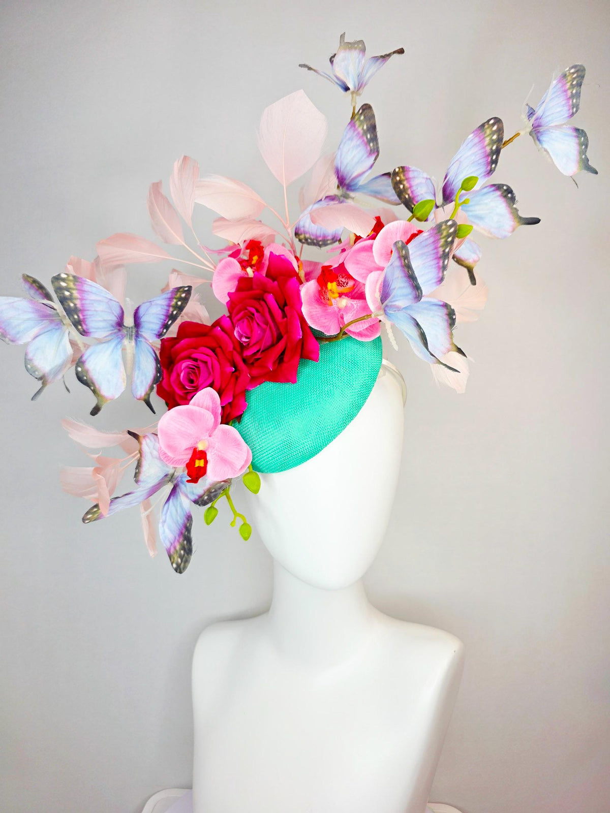 kentucky derby hat fascinator mint green sinamay red roses pink orchids pale light pink branching feathers black lavender purple butterflies