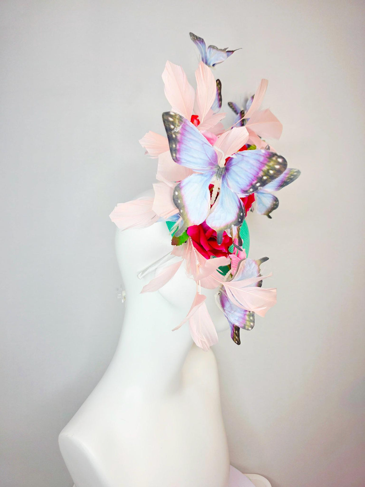 kentucky derby hat fascinator mint green sinamay red roses pink orchids pale light pink branching feathers black lavender purple butterflies