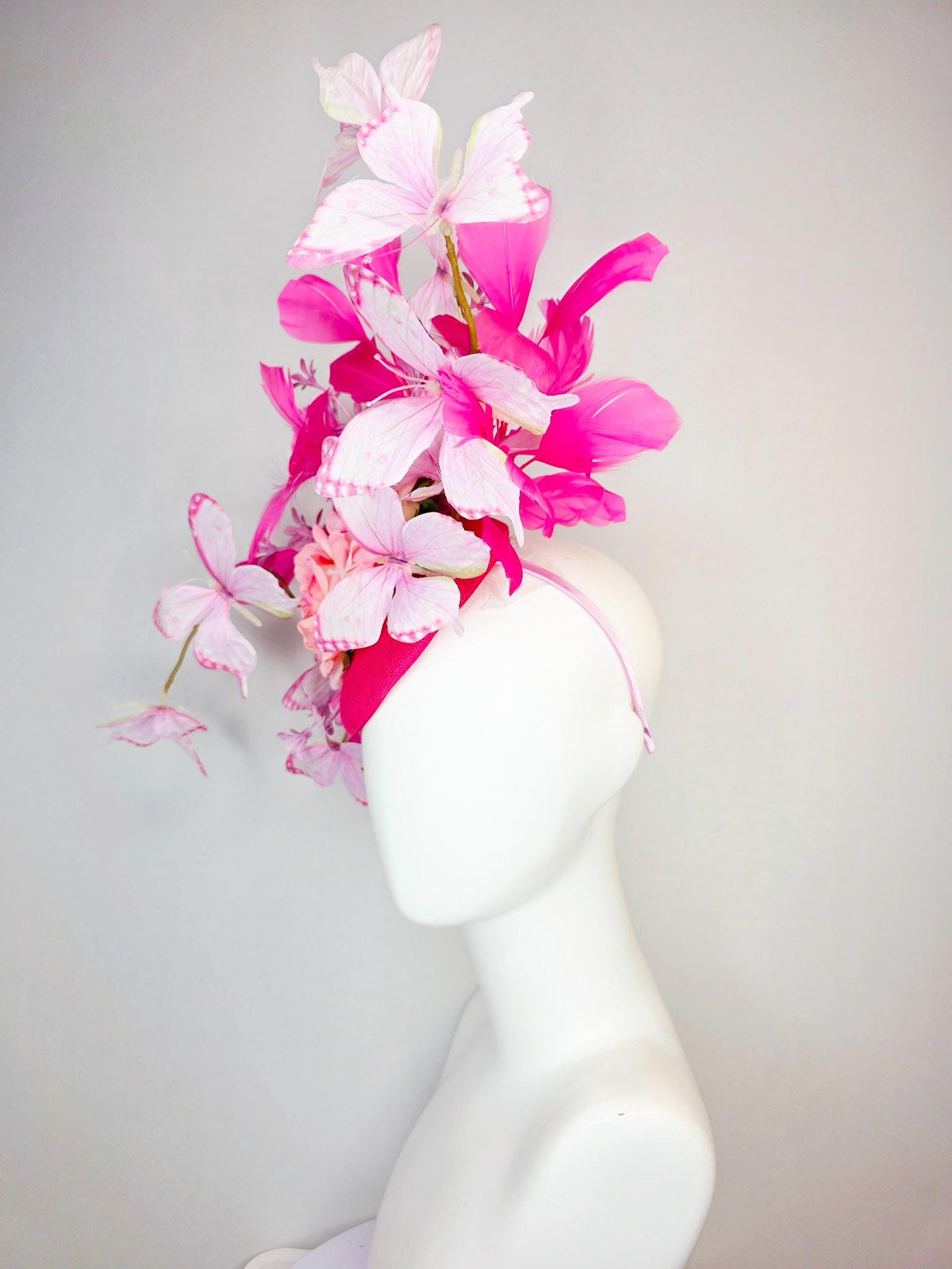 kentucky derby hat fascinator raspberry pink sinamay ombre pink satin roses lilac flowers hot pink branching feather light pink butterflies