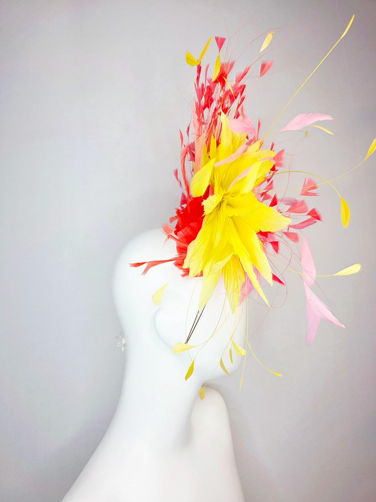 kentucky derby hat fascinator swarovski crystal headband with fluffy baby pink feather flower with yellow and coral red branching feathers