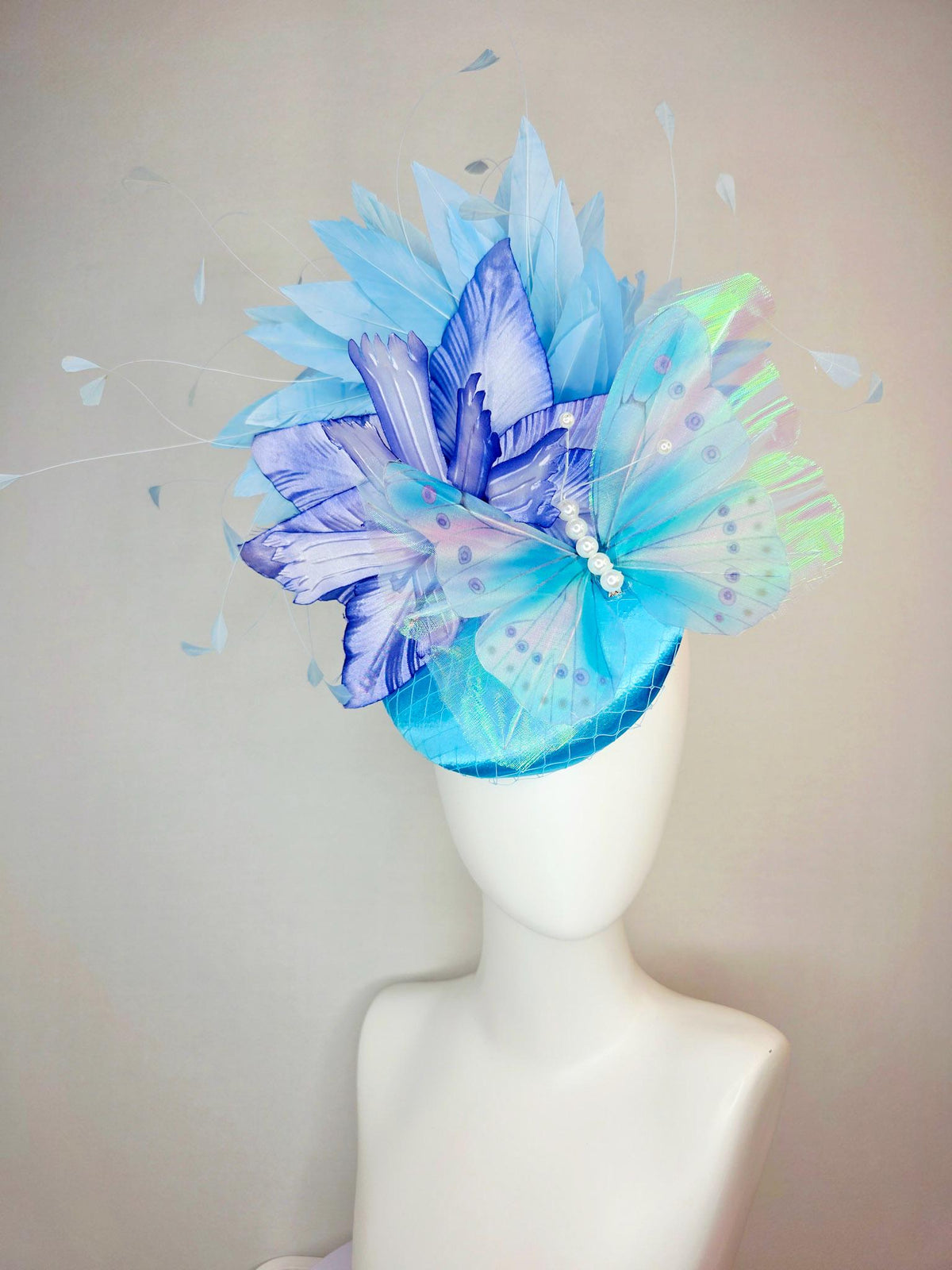 kentucky derby hat fascinator turquoise blue satin with netting ombre royal blue satin flower sky blue feathers large blue butterfly