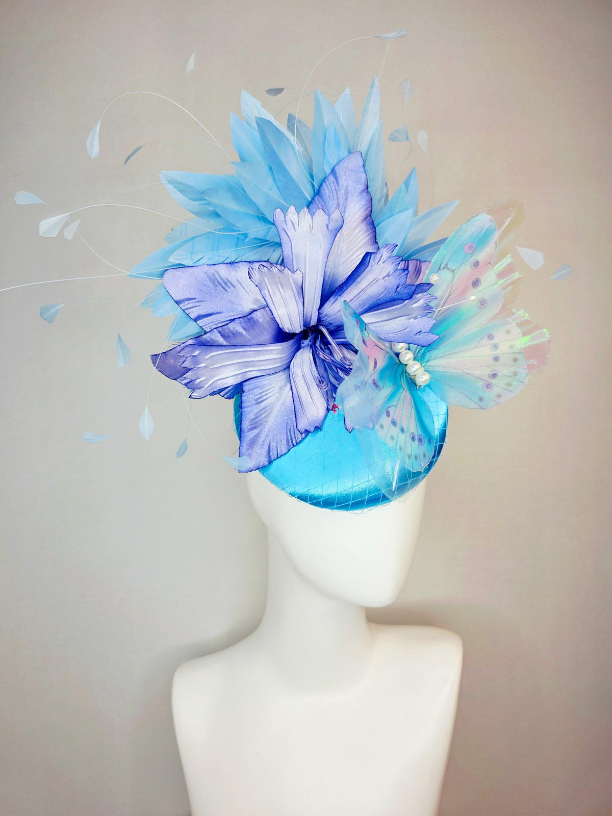 kentucky derby hat fascinator turquoise blue satin with netting ombre royal blue satin flower sky blue feathers large blue butterfly