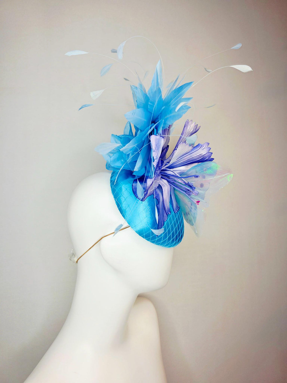 kentucky derby hat fascinator turquoise blue satin with netting ombre royal blue satin flower sky blue feathers large blue butterfly