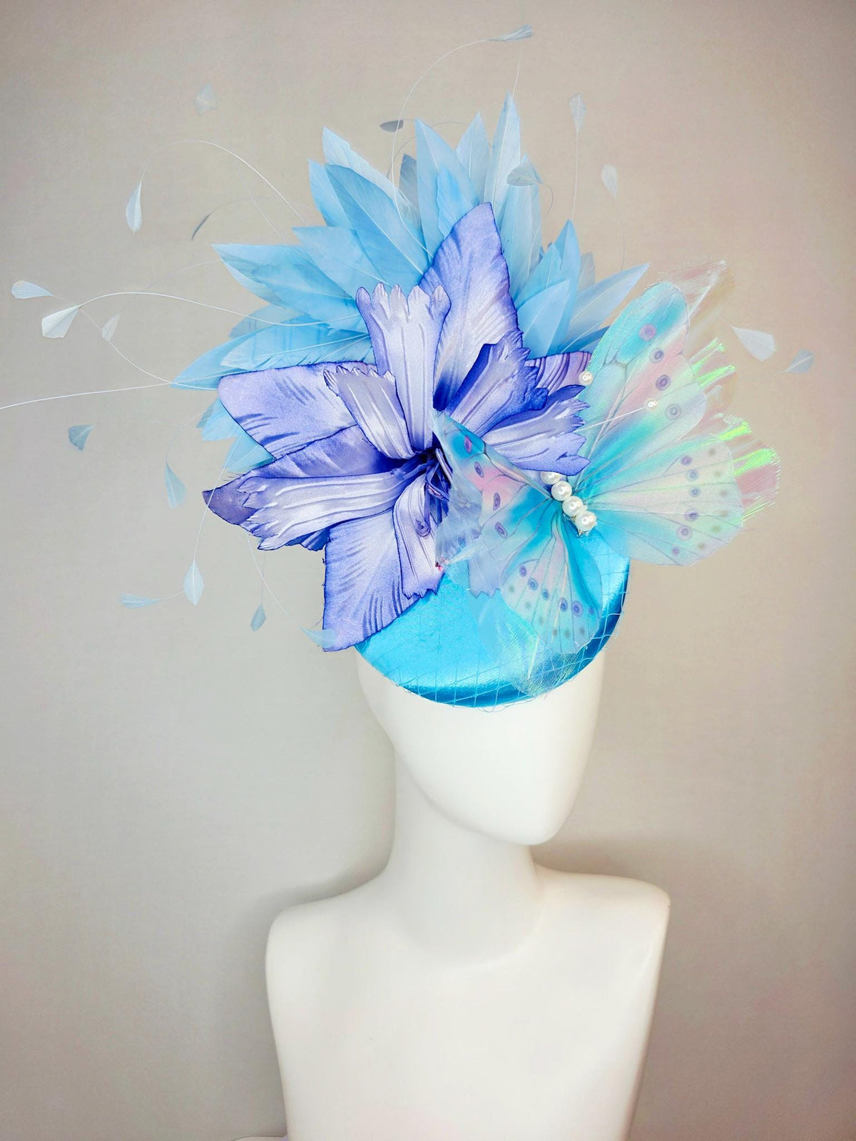 kentucky derby hat fascinator turquoise blue satin with netting ombre royal blue satin flower sky blue feathers large blue butterfly