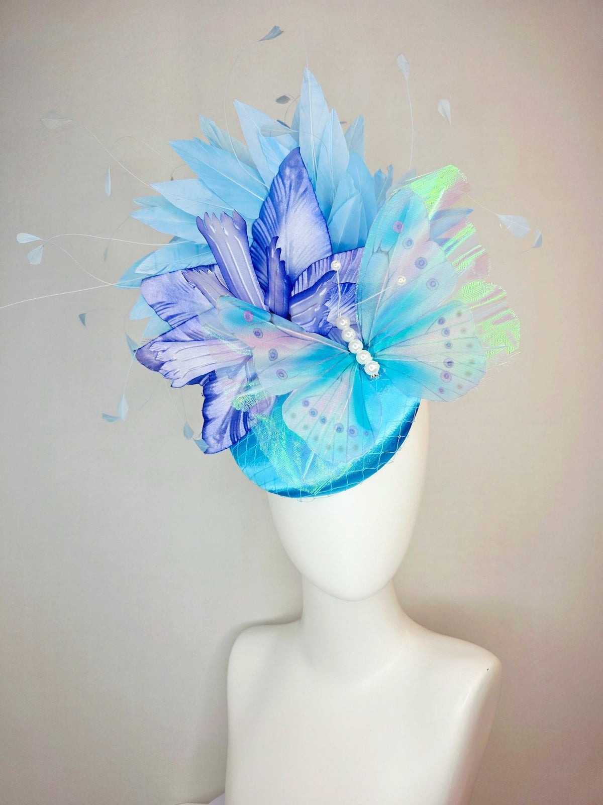 kentucky derby hat fascinator turquoise blue satin with netting ombre royal blue satin flower sky blue feathers large blue butterfly