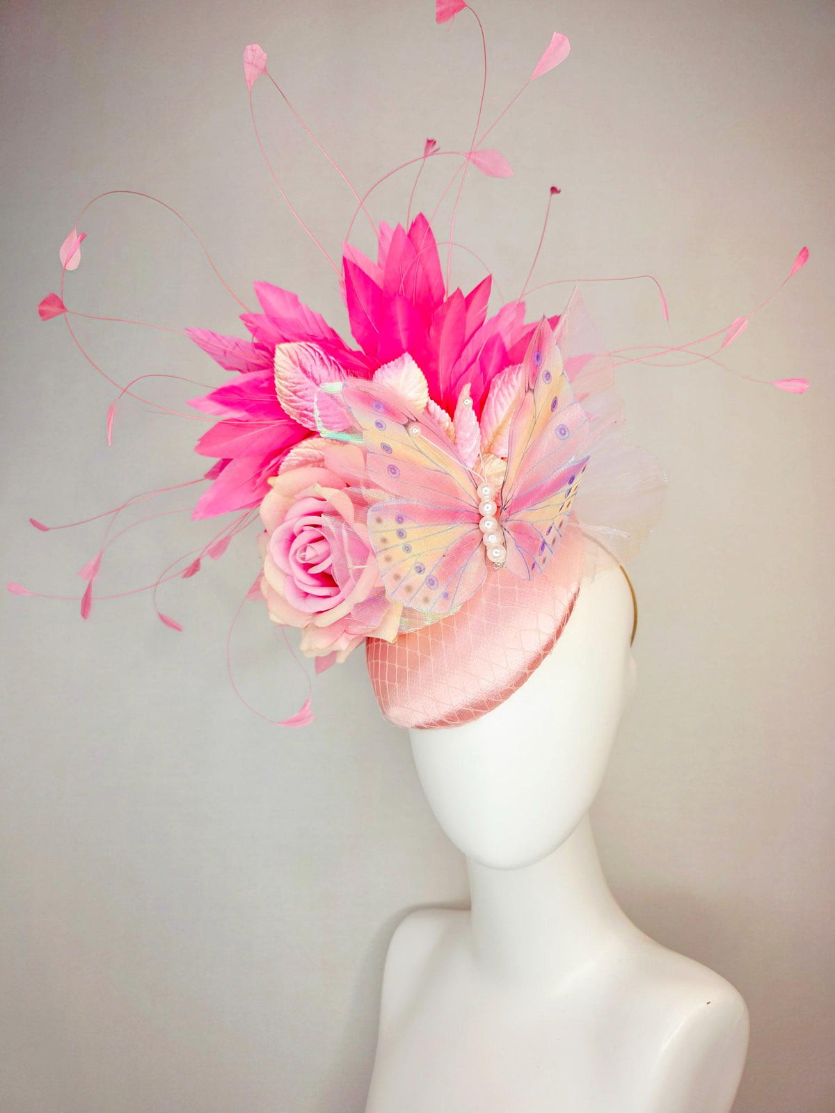 kentucky derby hat fascinator baby pink satin with netting ombre pink satin rose light pink leaves hot pink feathers and large butterfly