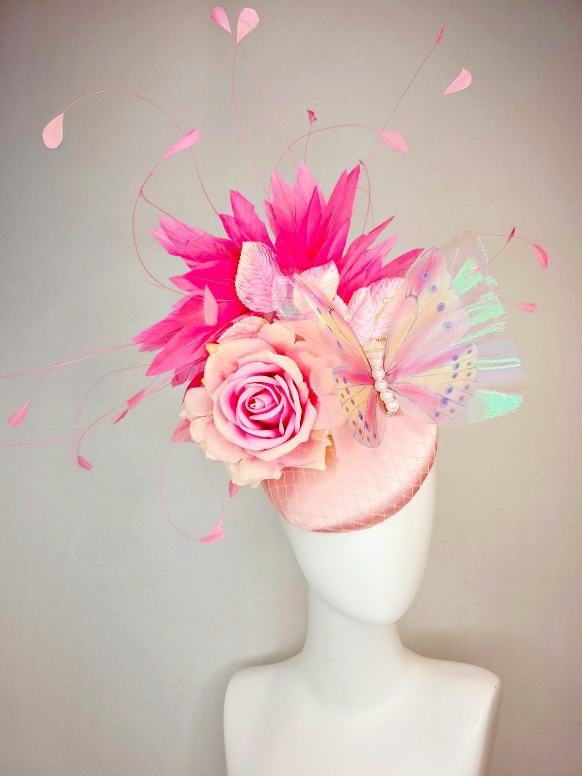 kentucky derby hat fascinator baby pink satin with netting ombre pink satin rose light pink leaves hot pink feathers and large butterfly