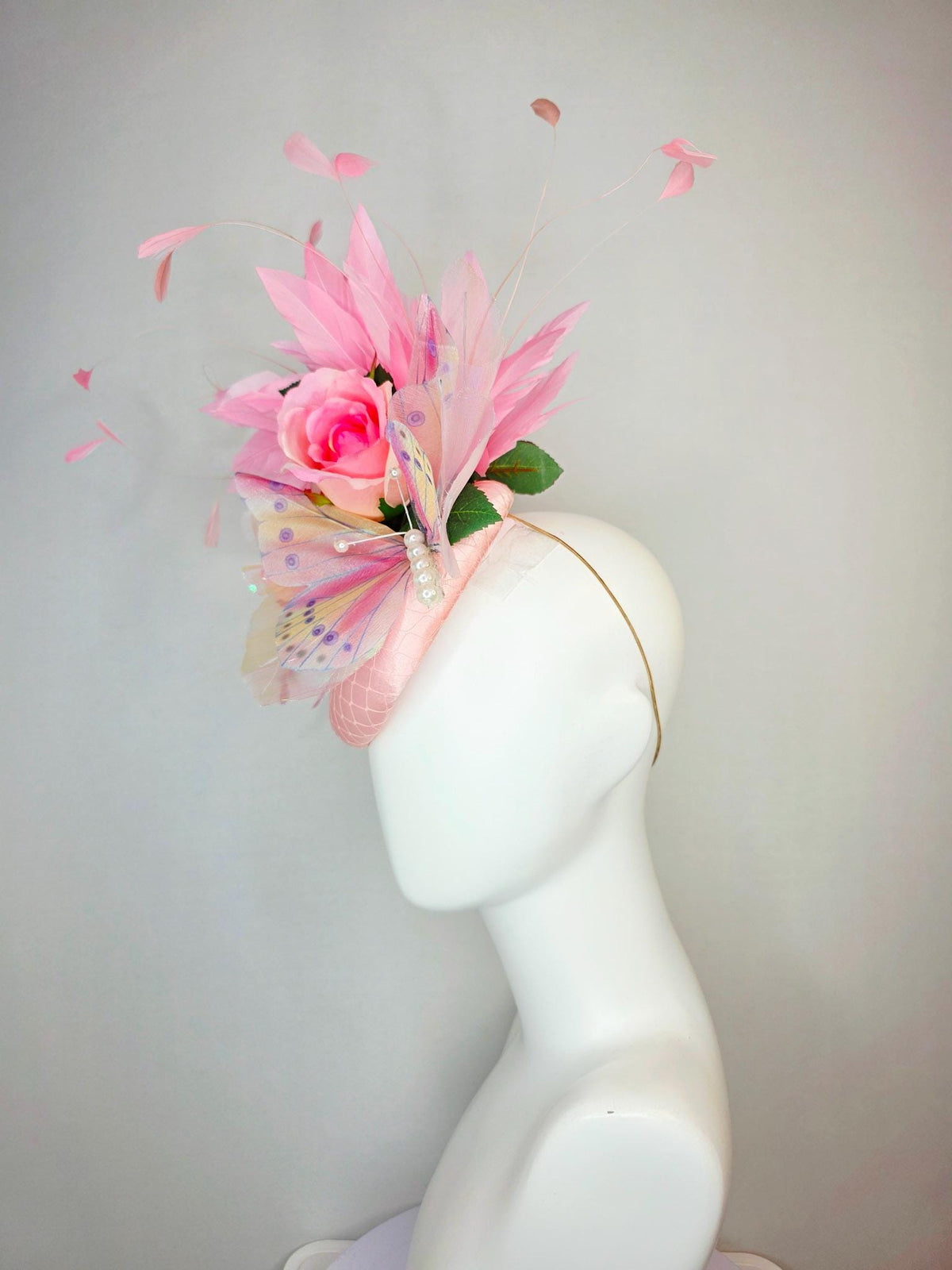 kentucky derby hat fascinator light pink satin with netting ombre pink satin roses green leaves baby blush pink feathers large butterfly