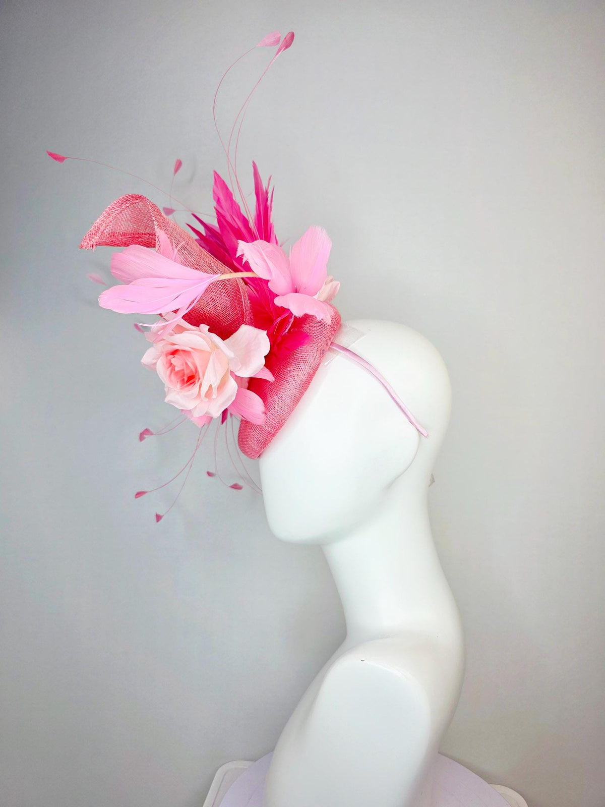 kentucky derby hat fascinator baby blush pink sinamay with sinamay curl and pale light pink satin rose flowers and pink branching feathers