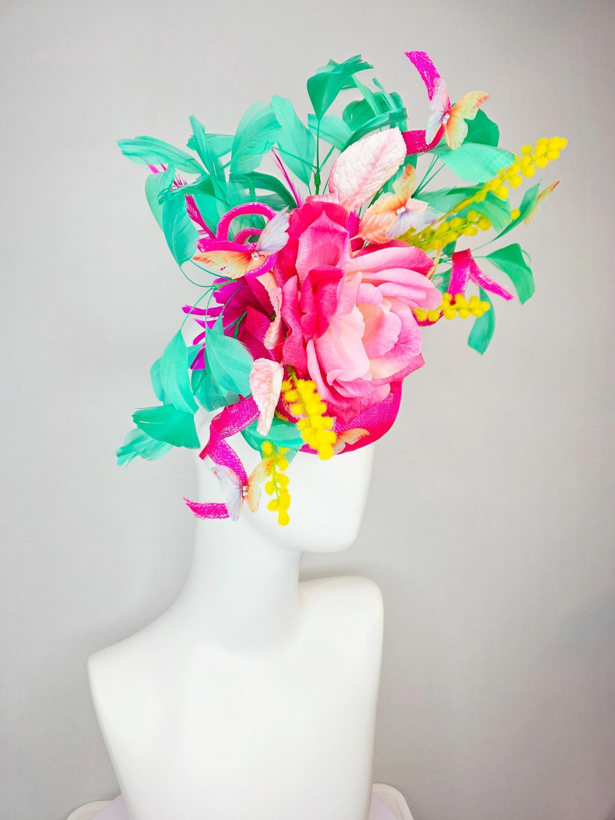 kentucky derby hat fascinator fuchsia pink sinamay ombre pink satin flower light pink leaves mint green feathers yellow stems butterflies