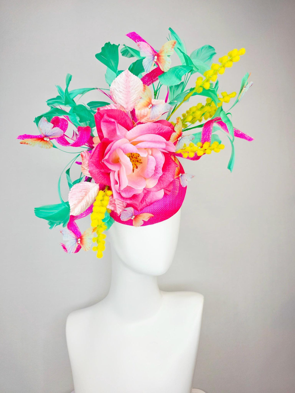 kentucky derby hat fascinator fuchsia pink sinamay ombre pink satin flower light pink leaves mint green feathers yellow stems butterflies