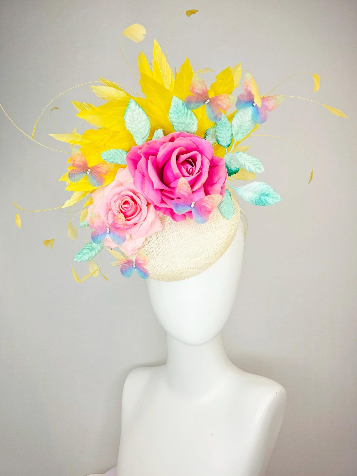 kentucky derby hat fascinator neutral ivory white sinamay and pink satin roses mint green leaves yellow feathers blue blush pink butterflies