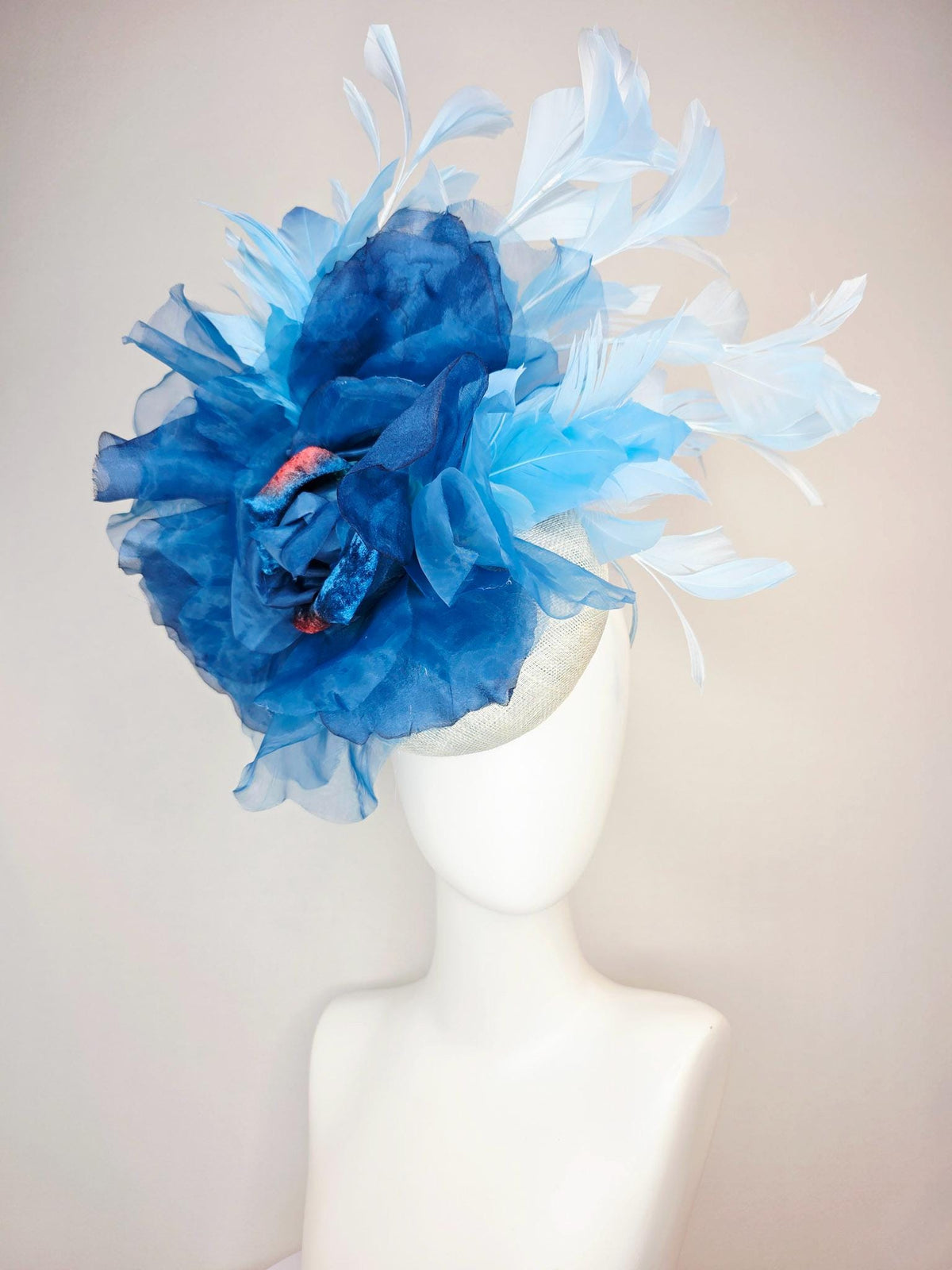 kentucky derby hat fascinator ivory white sinamay with large cobalt royal blue organza flower and light baby sky blue branching feathers