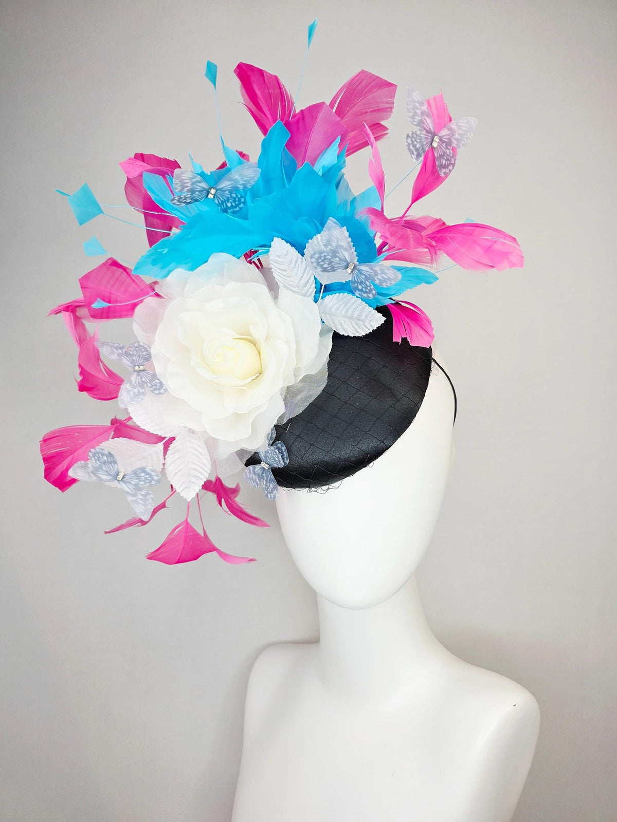 kentucky derby hat fascinator black satin with netting ivory white organza rose white leaves pink sky blue feathers light gray butterflies