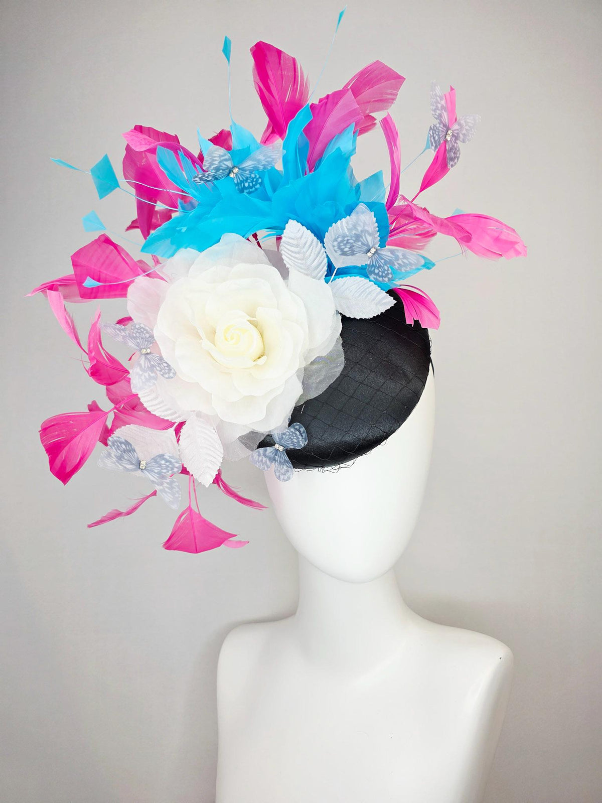 kentucky derby hat fascinator black satin with netting ivory white organza rose white leaves pink sky blue feathers light gray butterflies