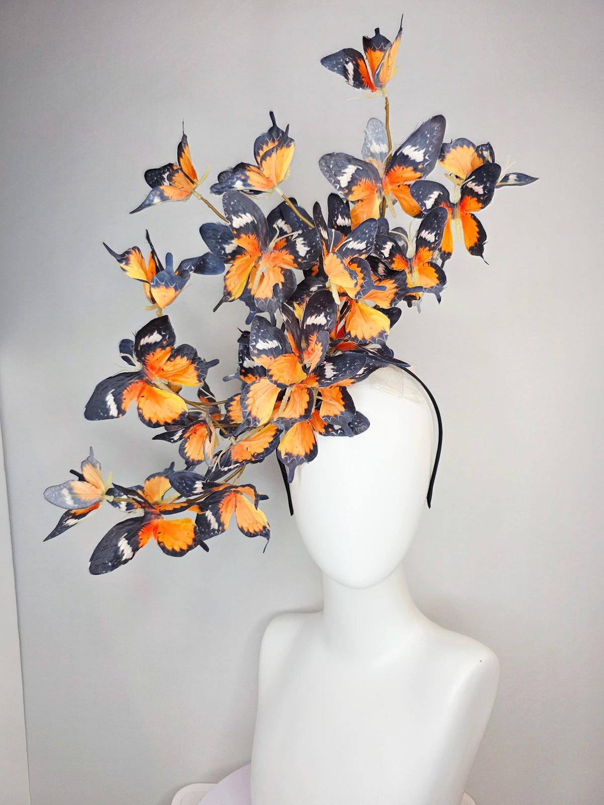 kentucky derby hat fascinator large branching warm burnt orange yellow black and white fabric butterflies on headband