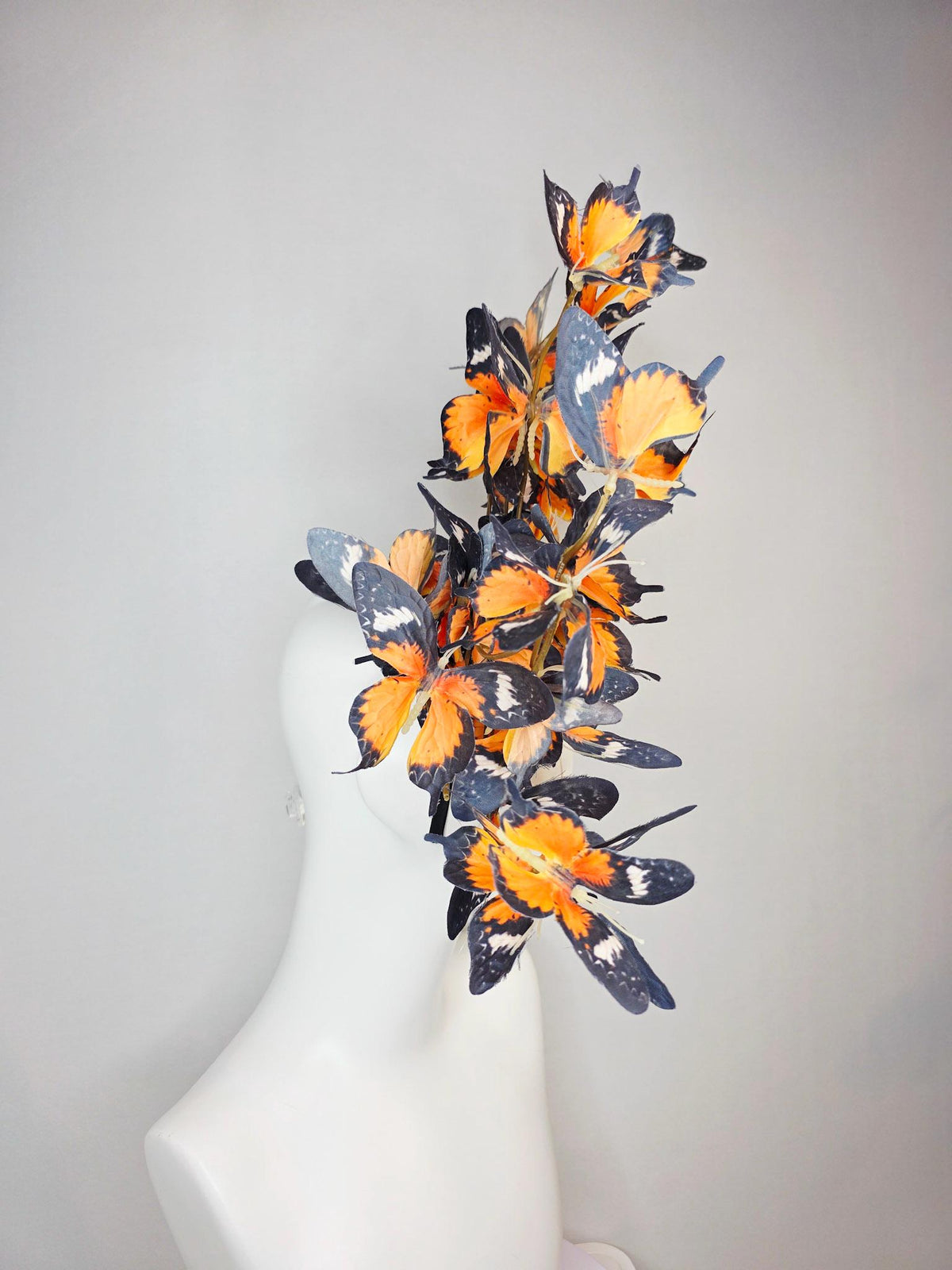 kentucky derby hat fascinator large branching warm burnt orange yellow black and white fabric butterflies on headband