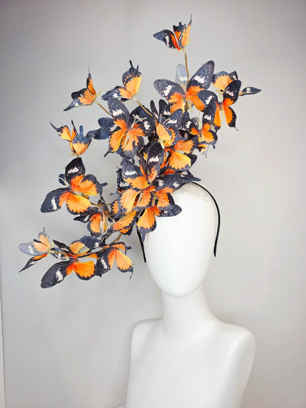 kentucky derby hat fascinator large branching warm burnt orange yellow black and white fabric butterflies on headband