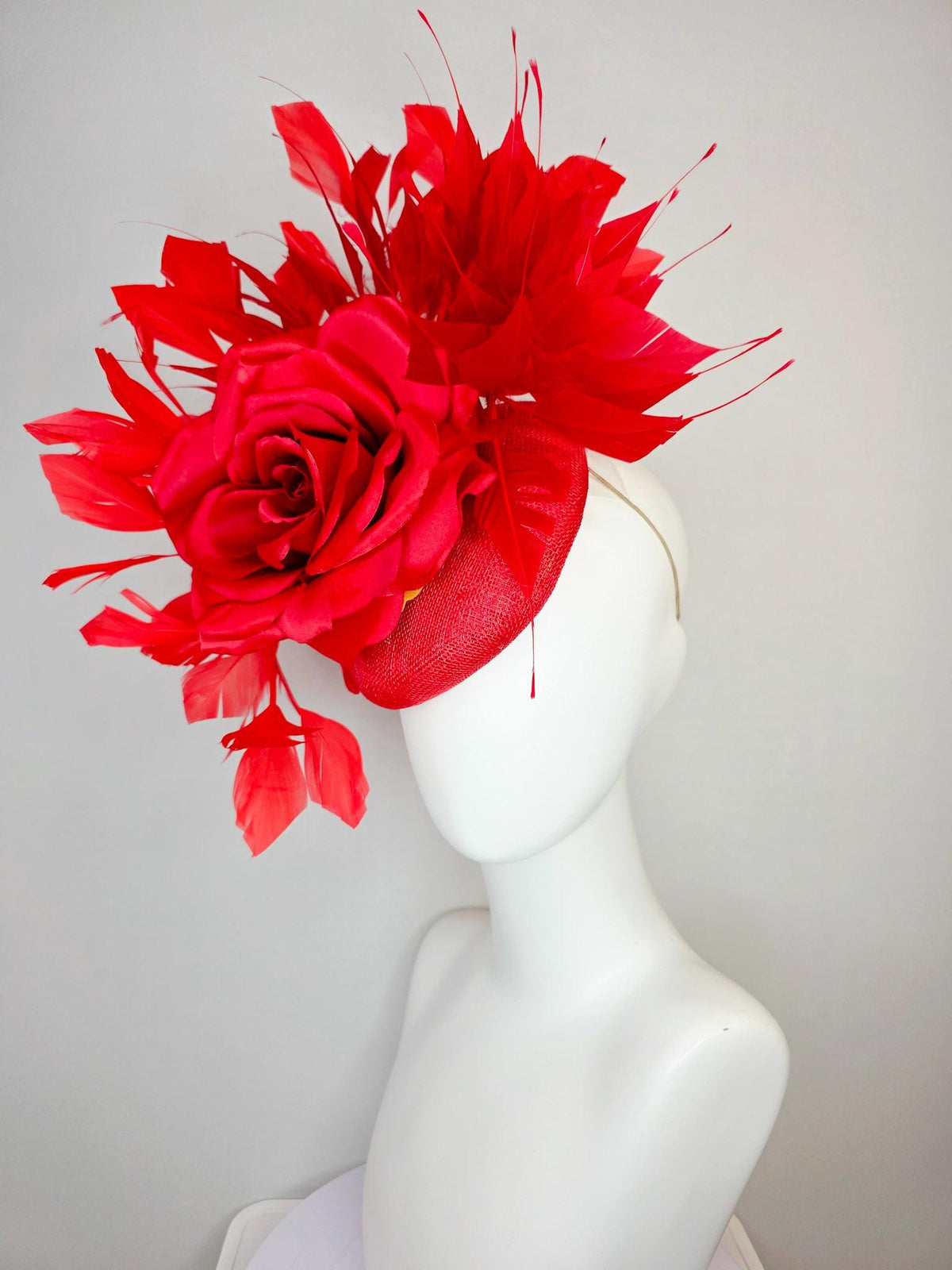 kentucky derby hat fascinator scarlet red sinamay base with large bright red satin rose and cherry red branching feathers