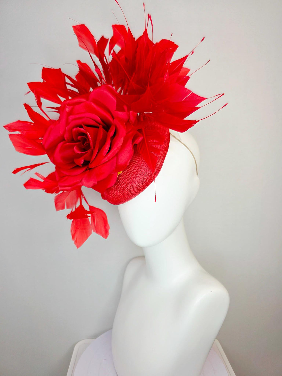 kentucky derby hat fascinator scarlet red sinamay base with large bright red satin rose and cherry red branching feathers