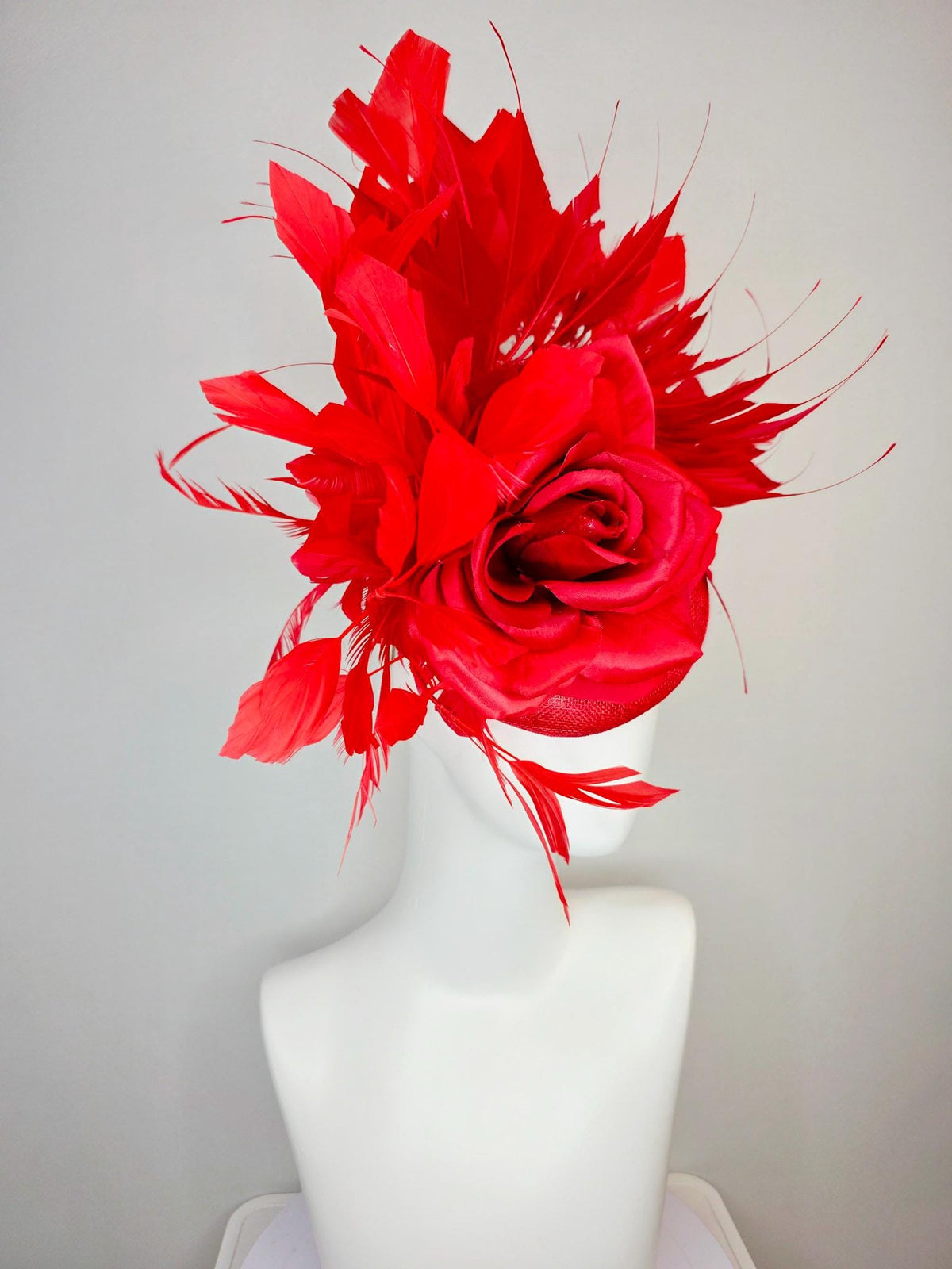 kentucky derby hat fascinator scarlet red sinamay base with large bright red satin rose and cherry red branching feathers