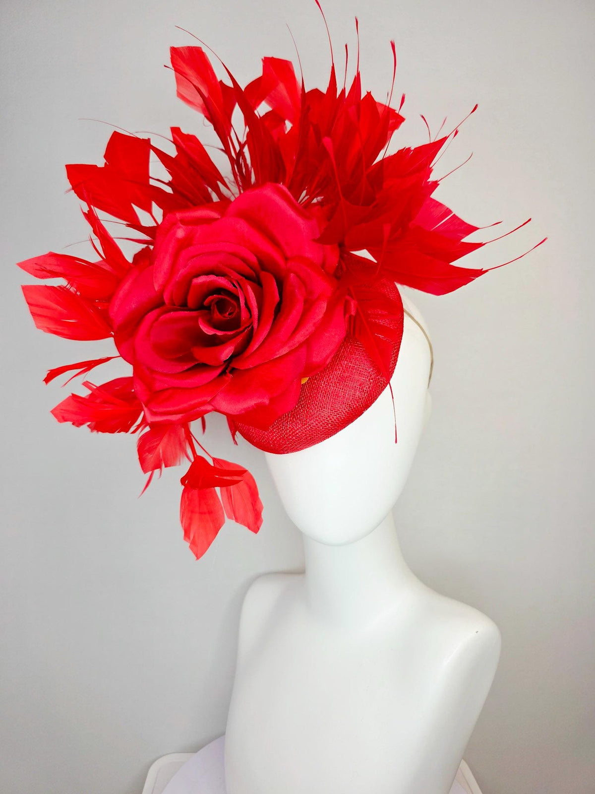 kentucky derby hat fascinator scarlet red sinamay base with large bright red satin rose and cherry red branching feathers